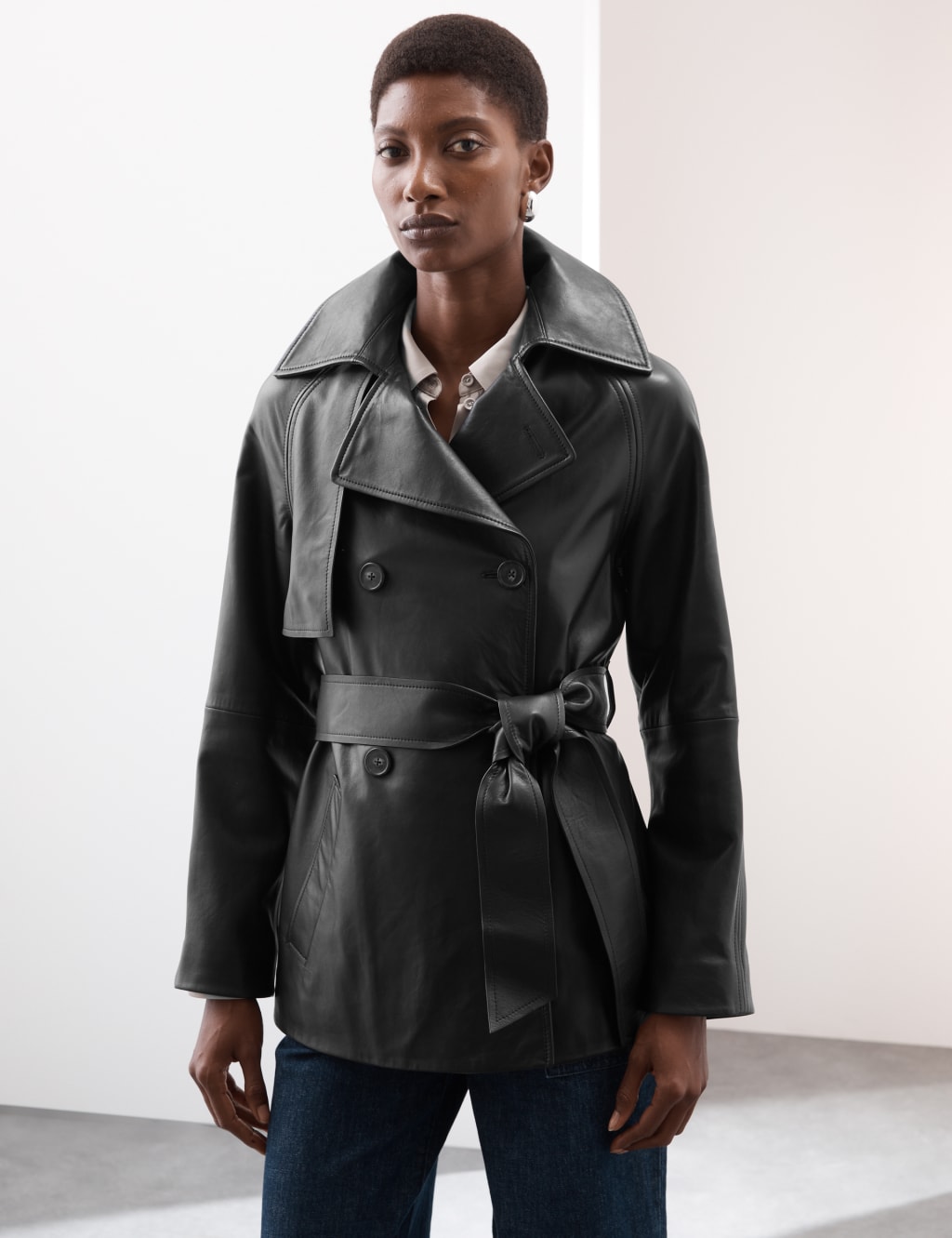 Leather belted trench coat top