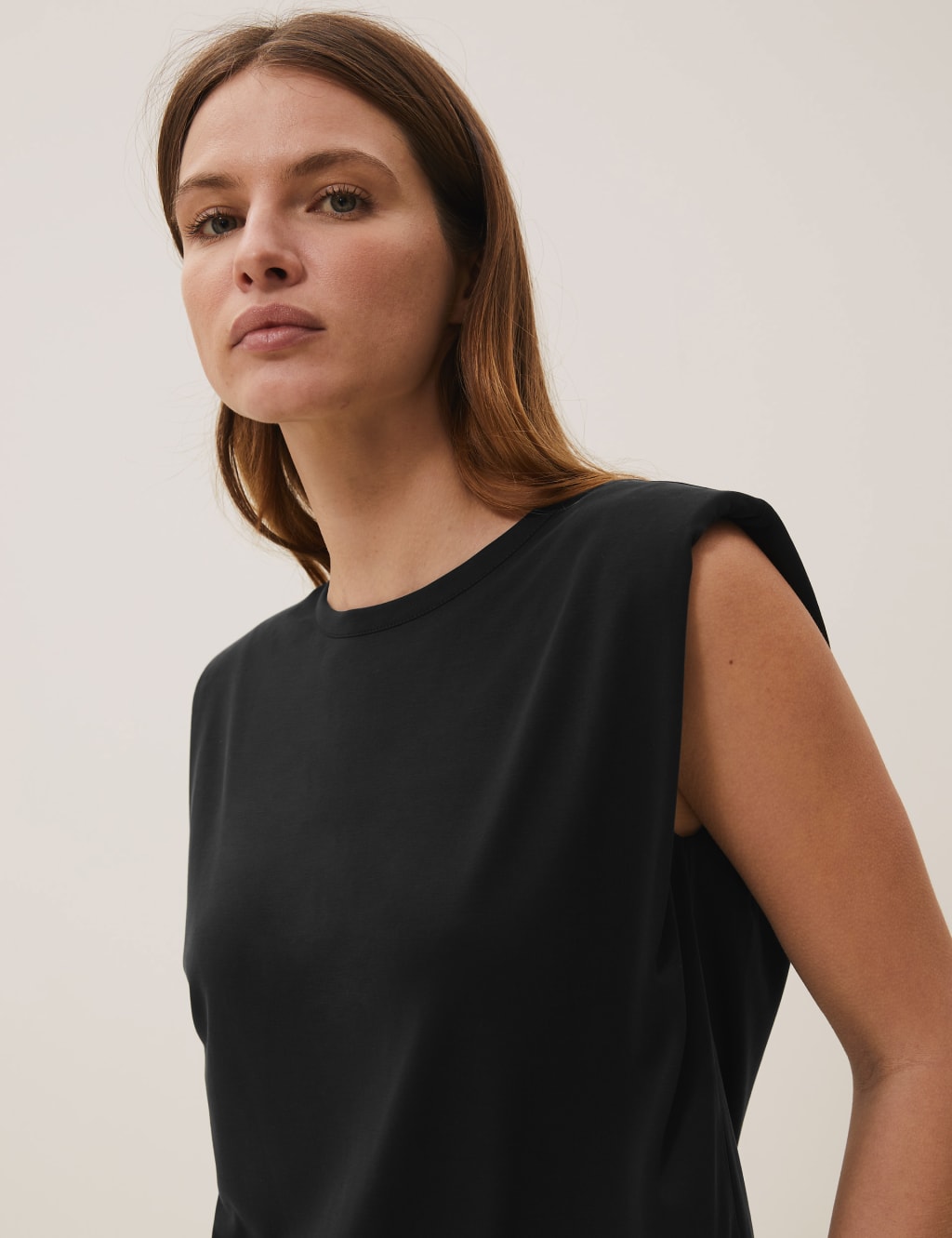 Sleeveless top with shoulder pads best sale