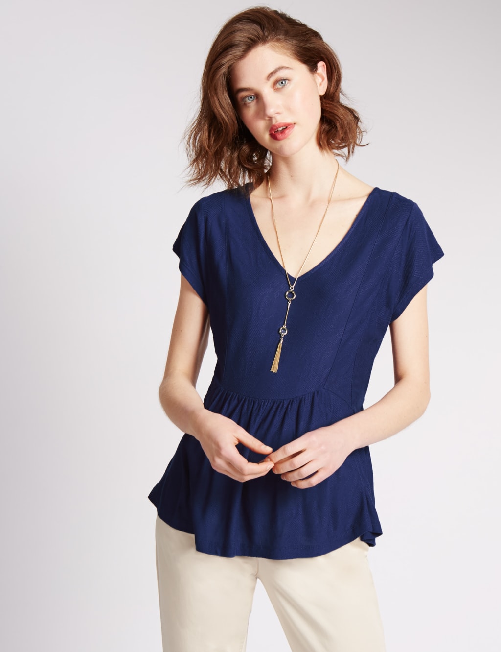 Peplum Textured Top 1 of 3