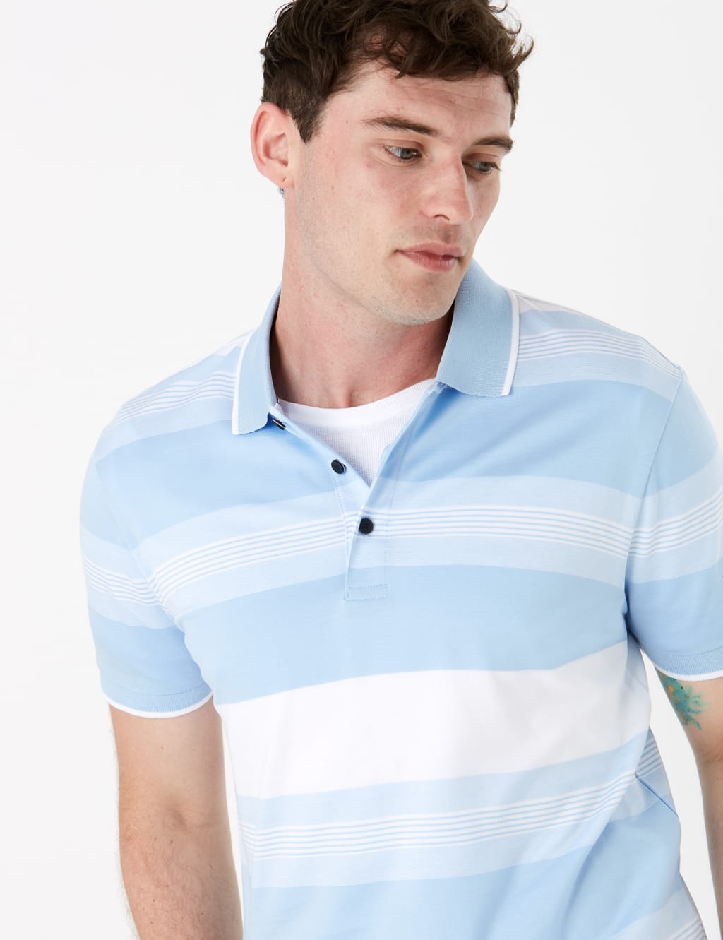 Striped blue polo shirt on sale