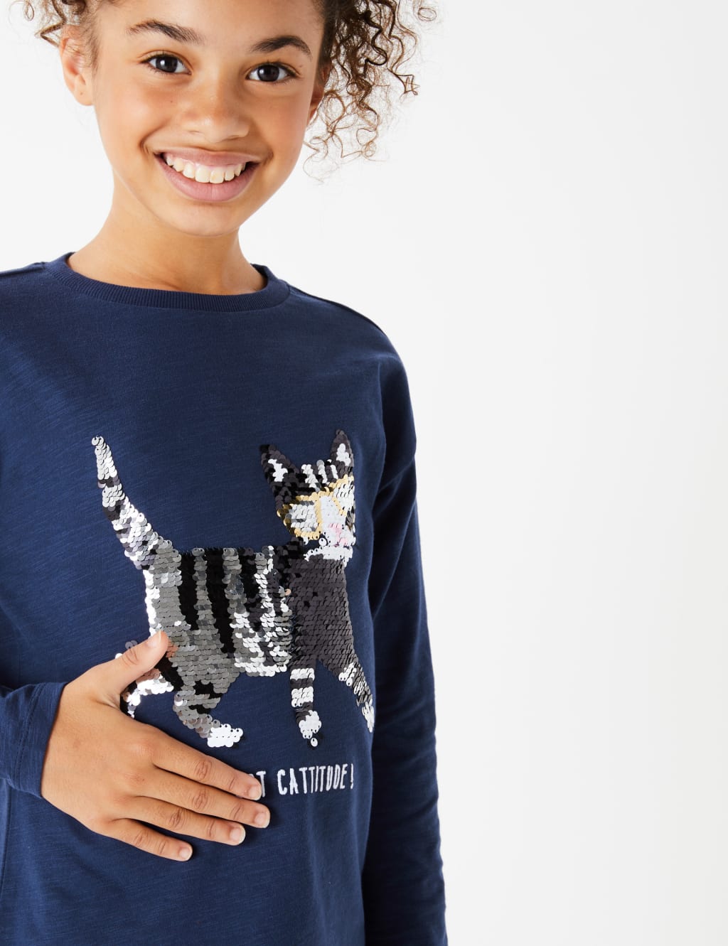 Reversible sequin top outlet