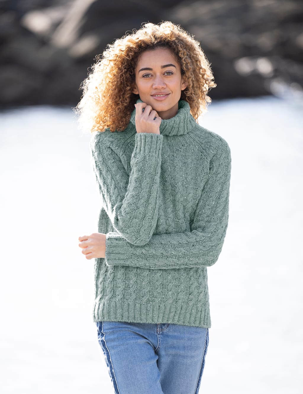 Cable knit roll neck jumper sales