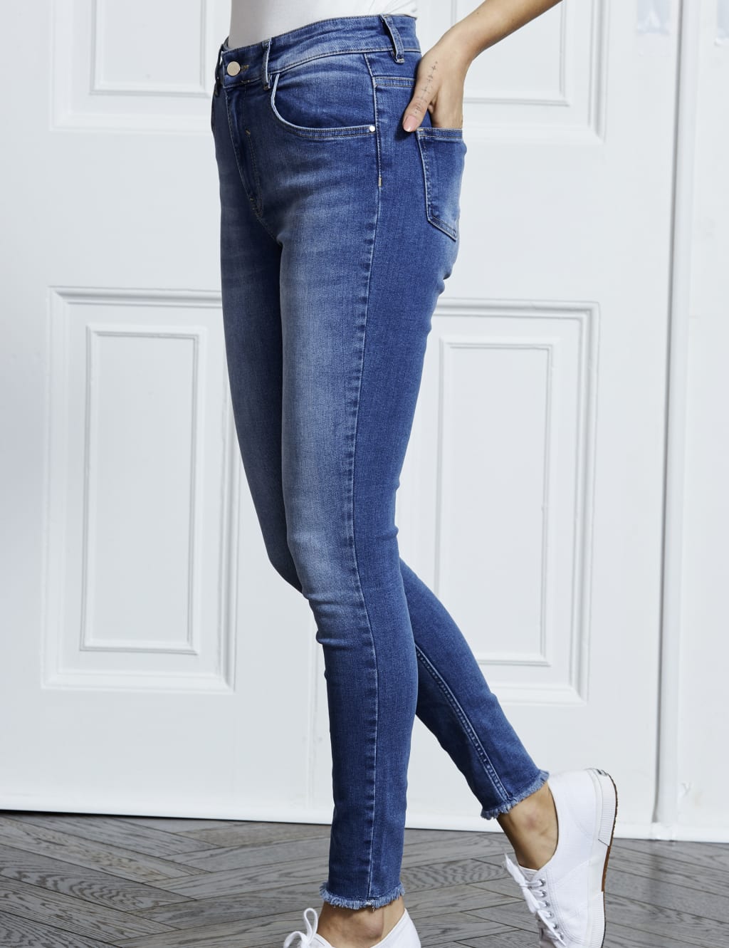 Raw edge skinny jeans top