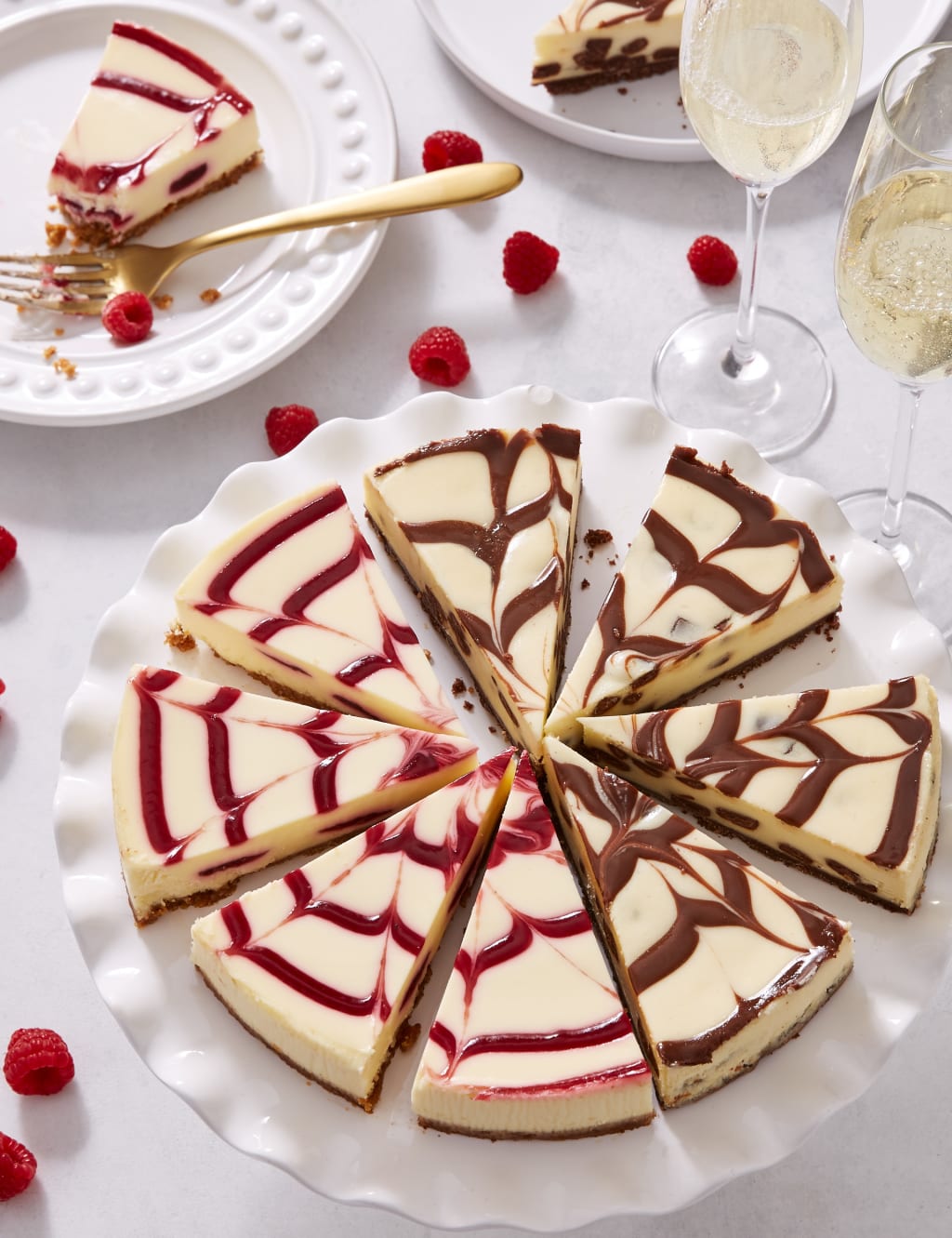 Chocolate & Raspberry Mixed Cheesecake Selection (Serves 10) 1 of 2