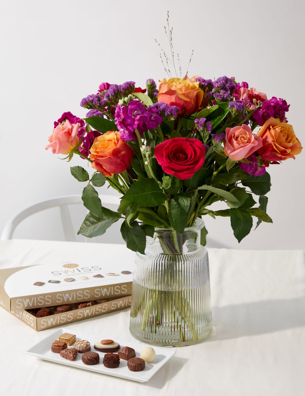 Rose, Statice & Spray Stock Bright Bouquet with Swiss Chocolates 1 of 6