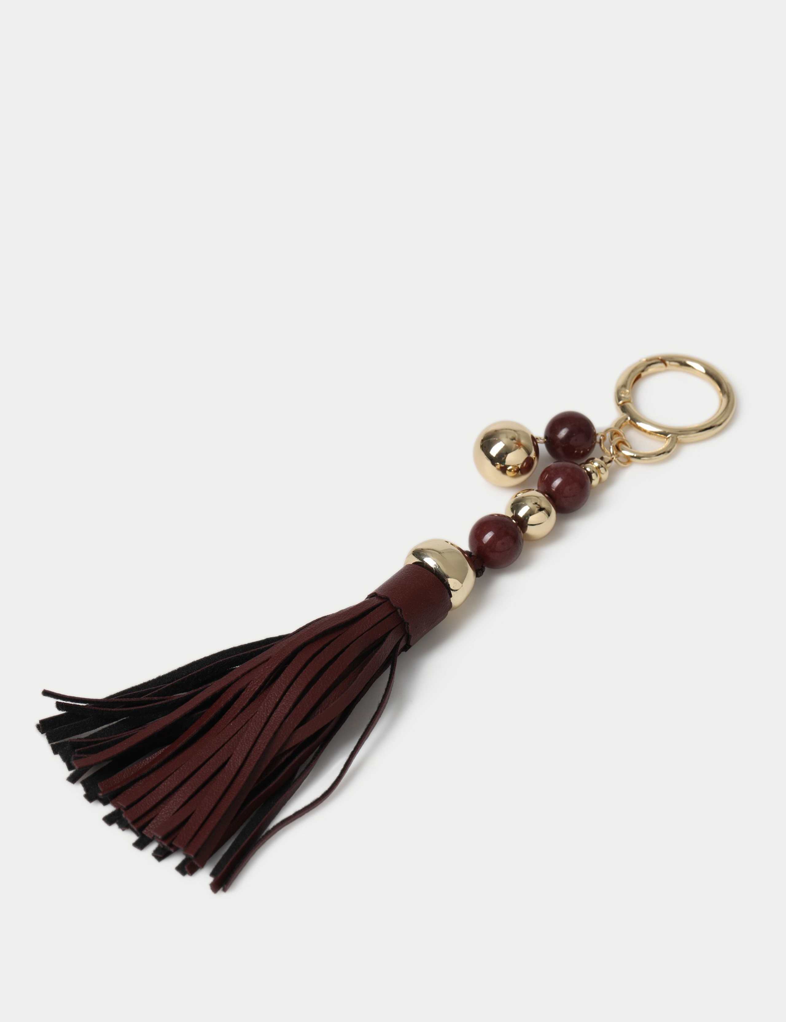Natural Stone Burgundy Tassel Bag Charm 1 of 2