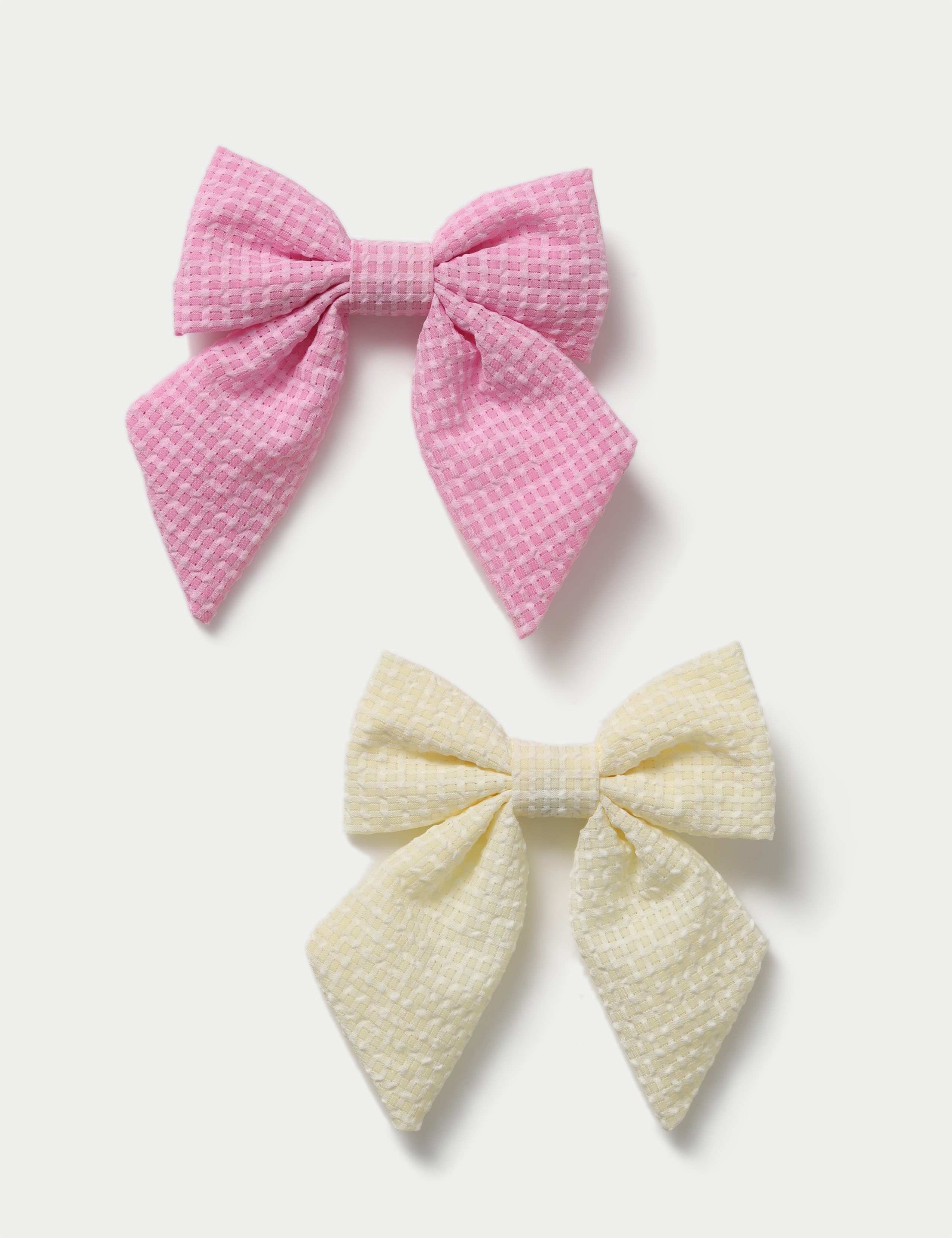 YG MINI YELLOW AND PINK MINI BOWS 1 of 2