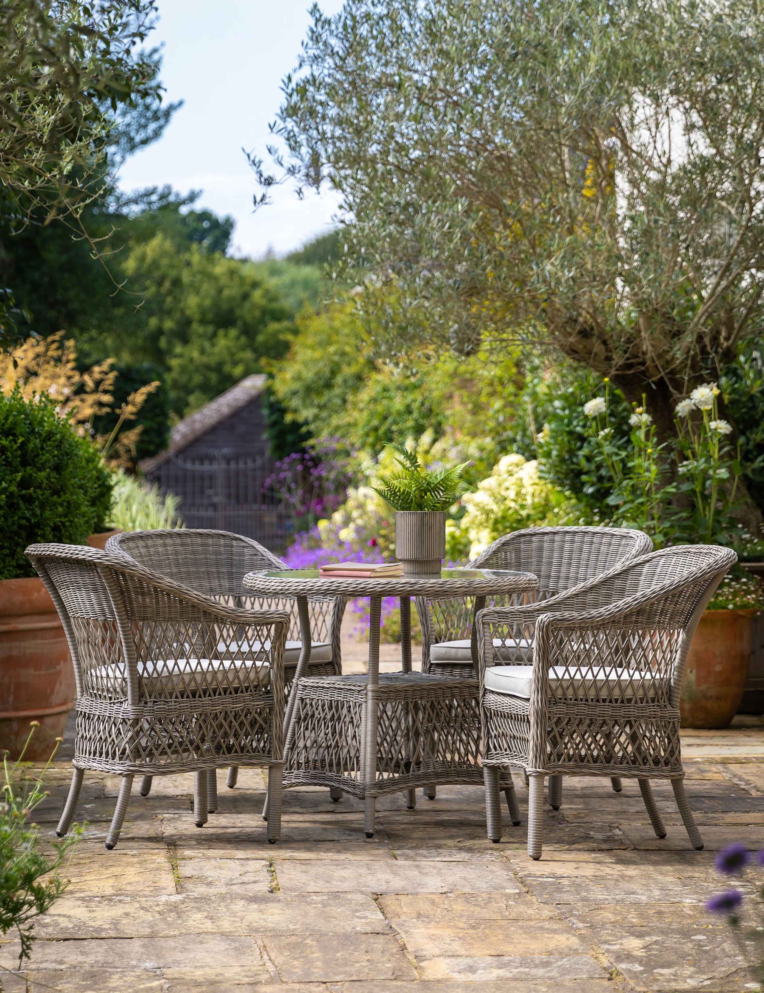 Menton 4 Seater Round Garden Table and Chairs 1 of 8