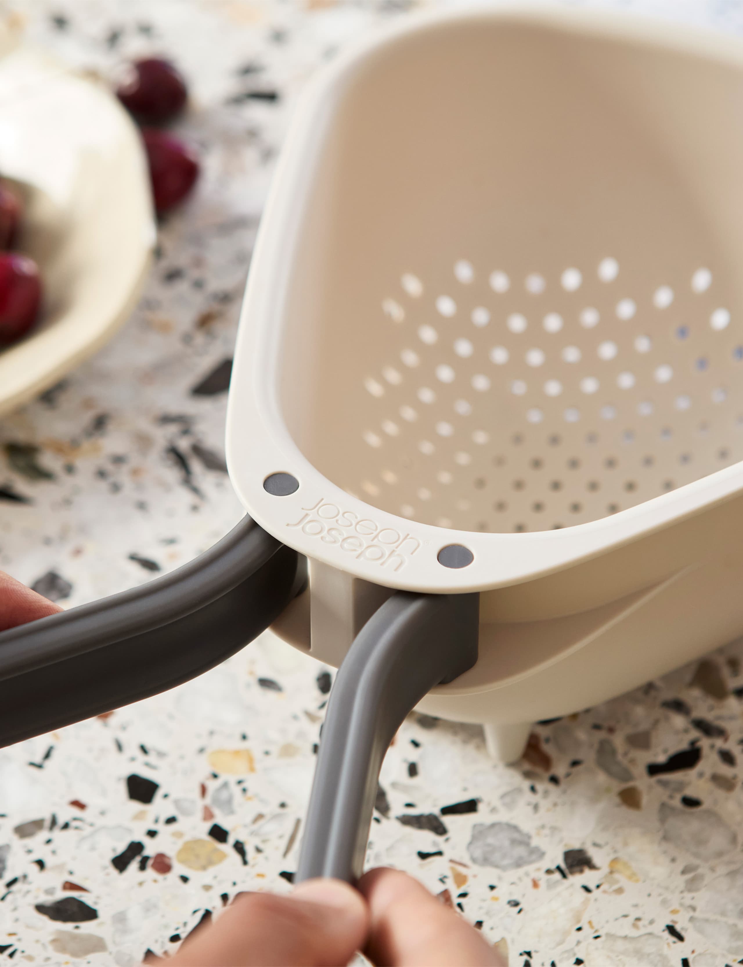 Droplet Colander with Folding Handles 4 of 5