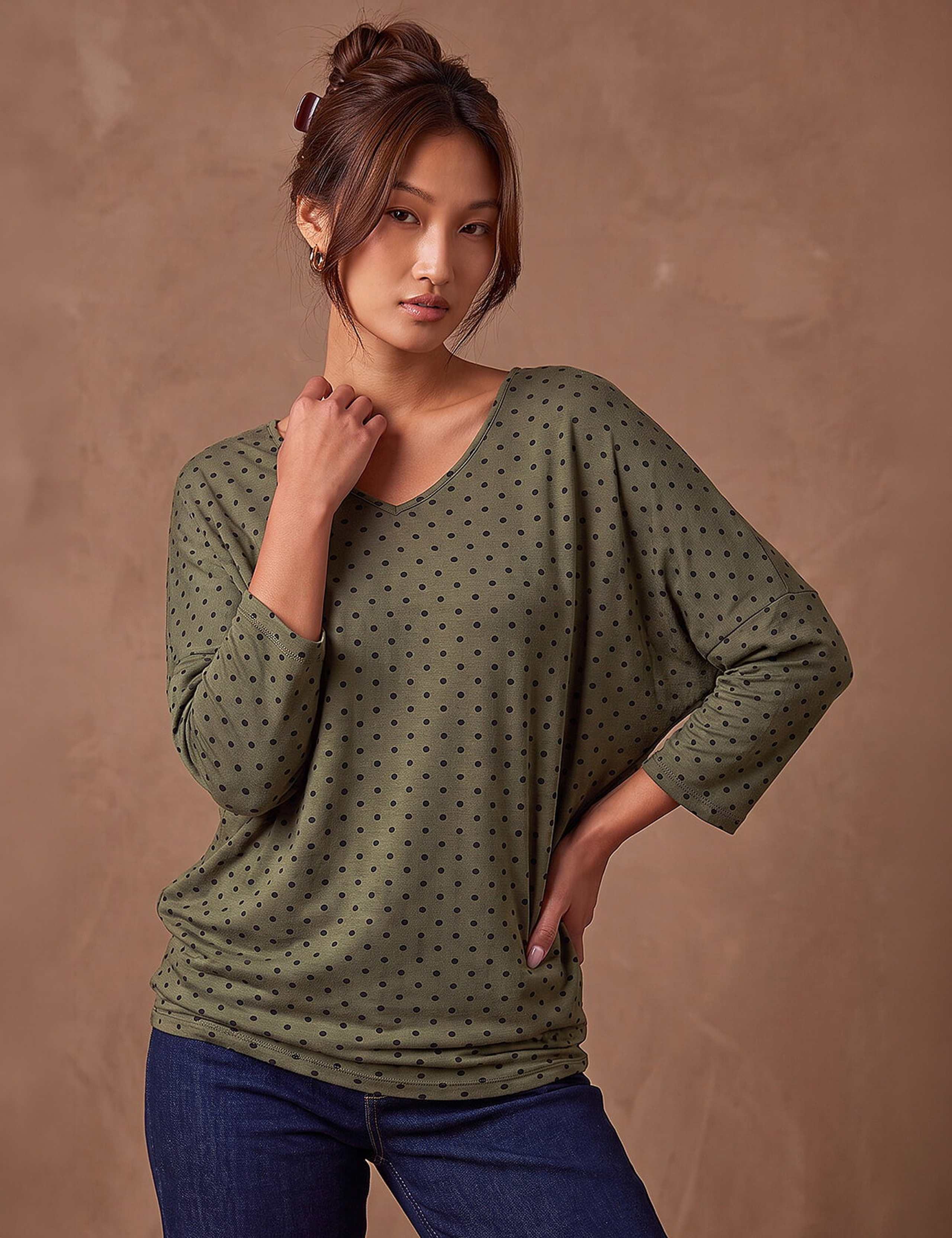 Polka Dot V Neck Stretch Top 1 of 4