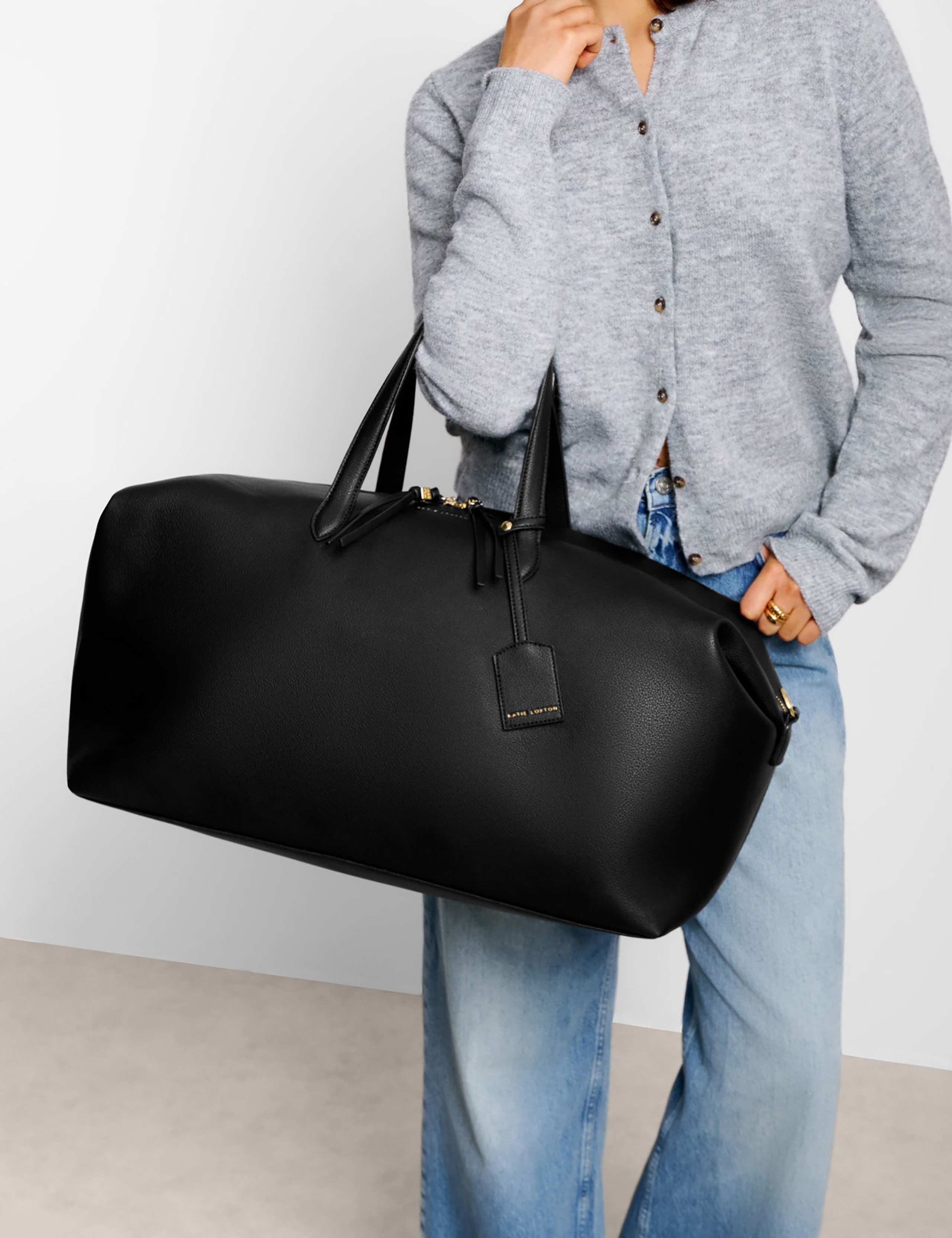 Faux Leather Padded Top Handle Weekend Bag 1 of 7