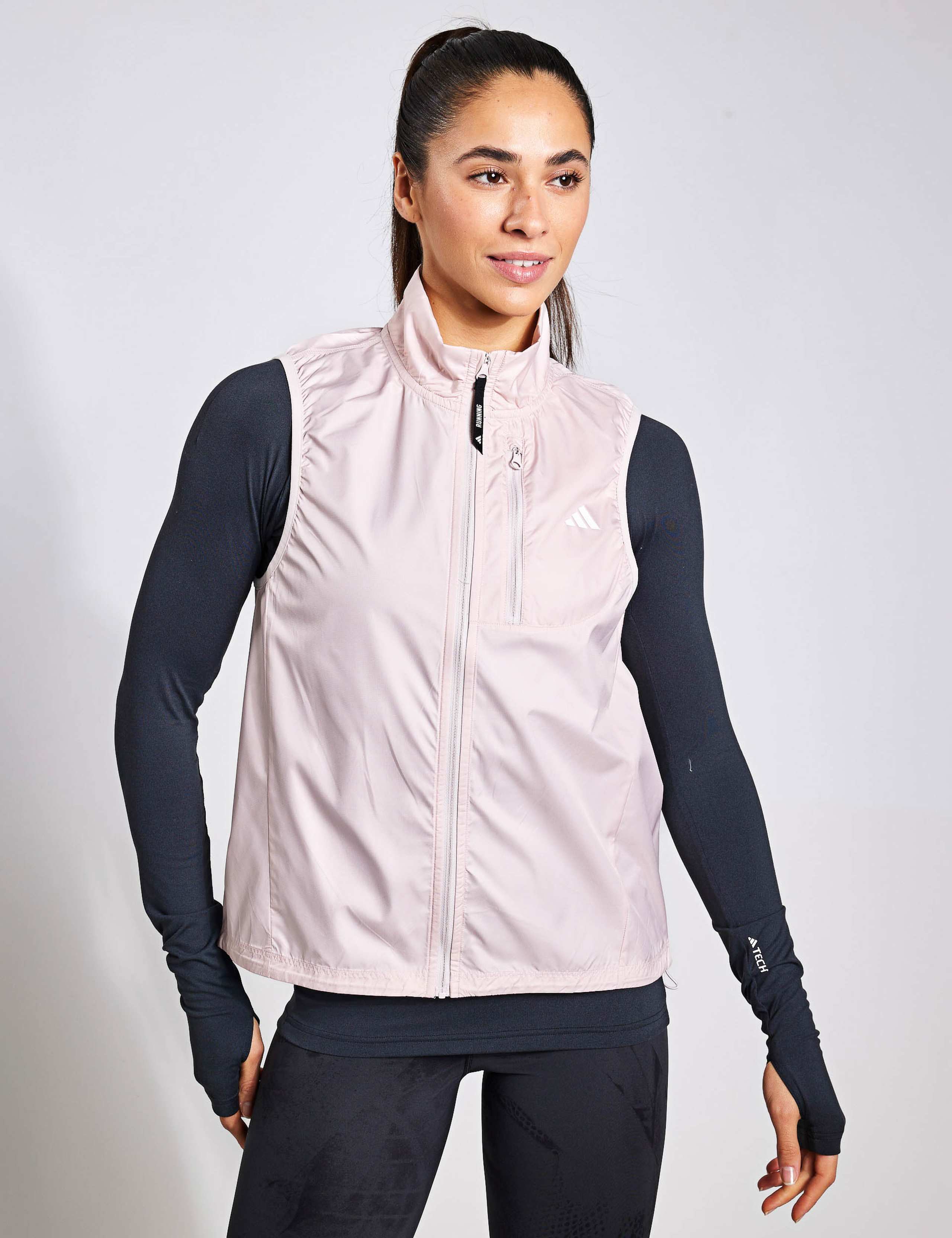 Own The Run Funnel Neck Gilet 1 of 4