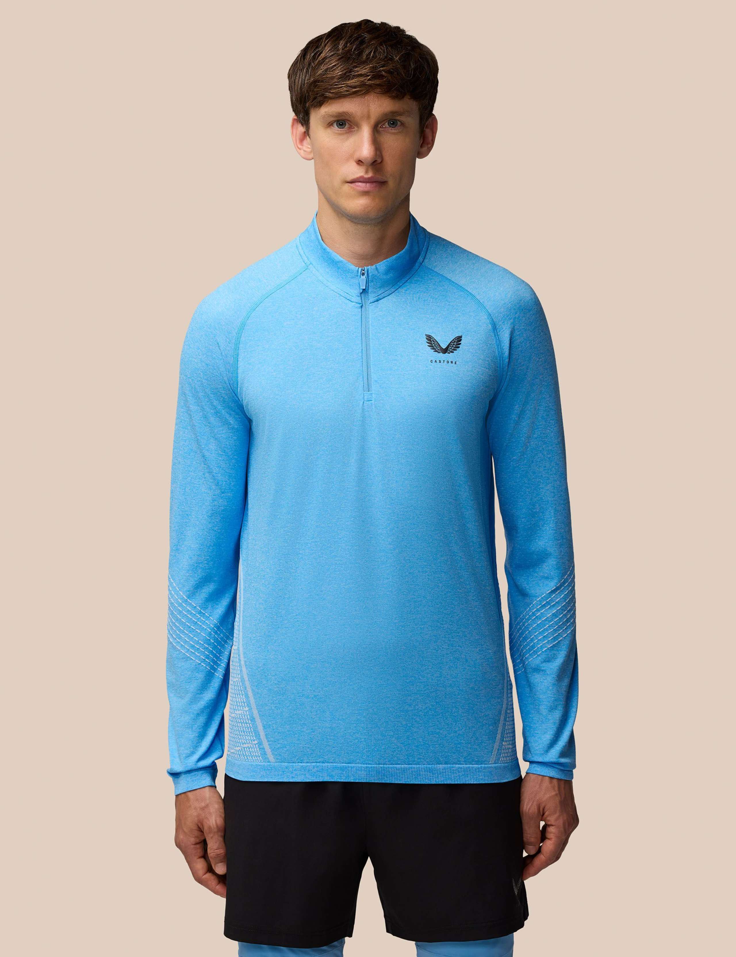 Seam Free Funnel Neck Half Zip Sports Top 1 of 6
