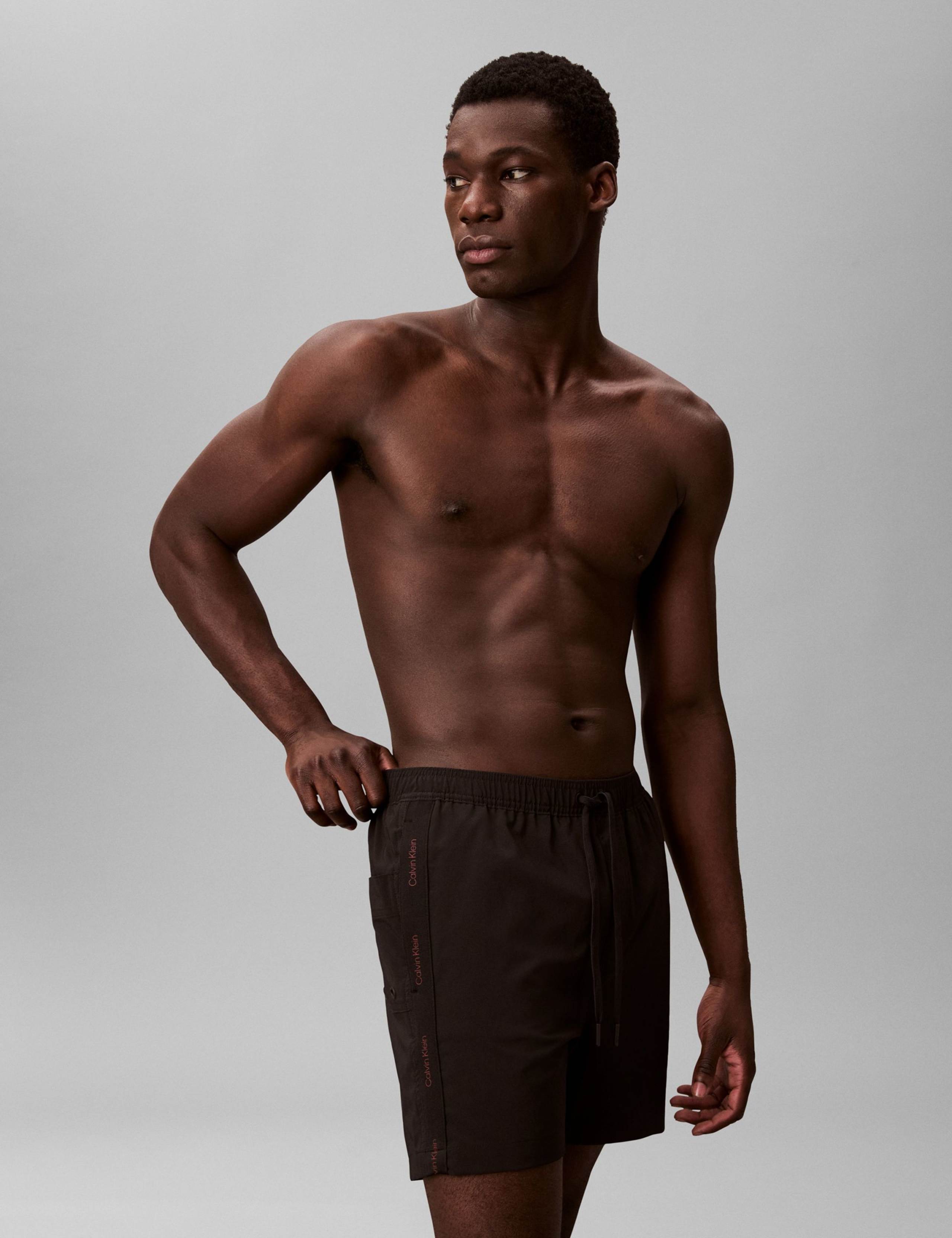 Logo Tape Swim Shorts 1 of 6