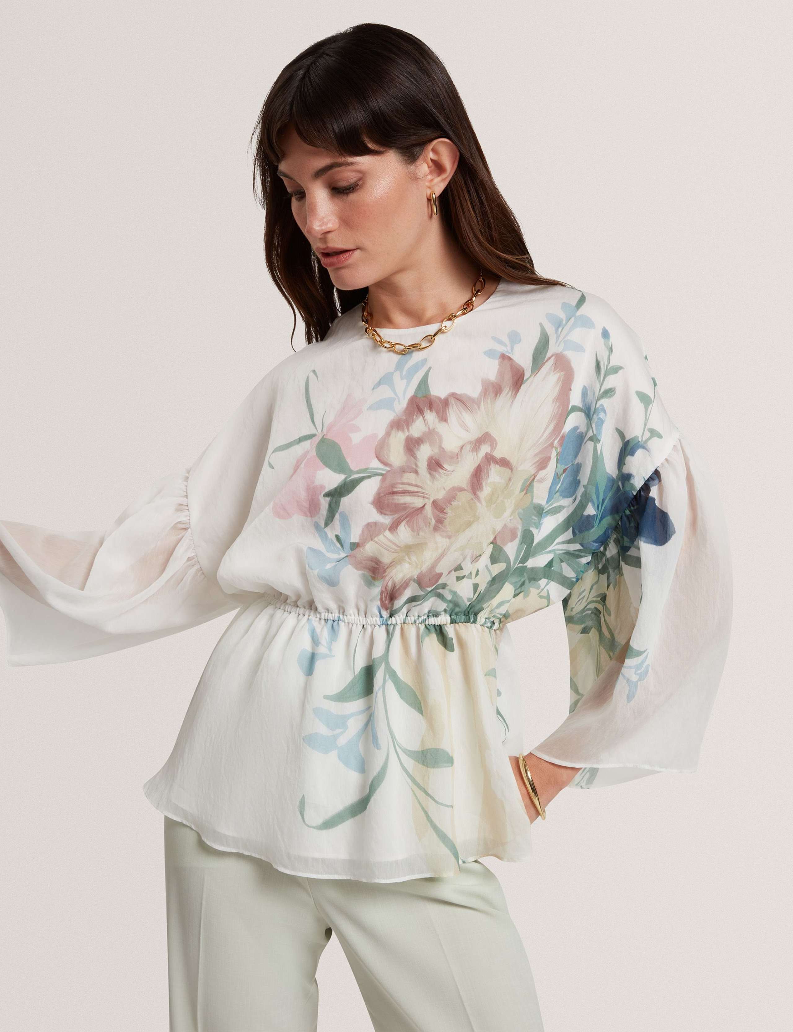 Lyocell Rich Floral Puff Sleeve Peplum Top 1 of 7