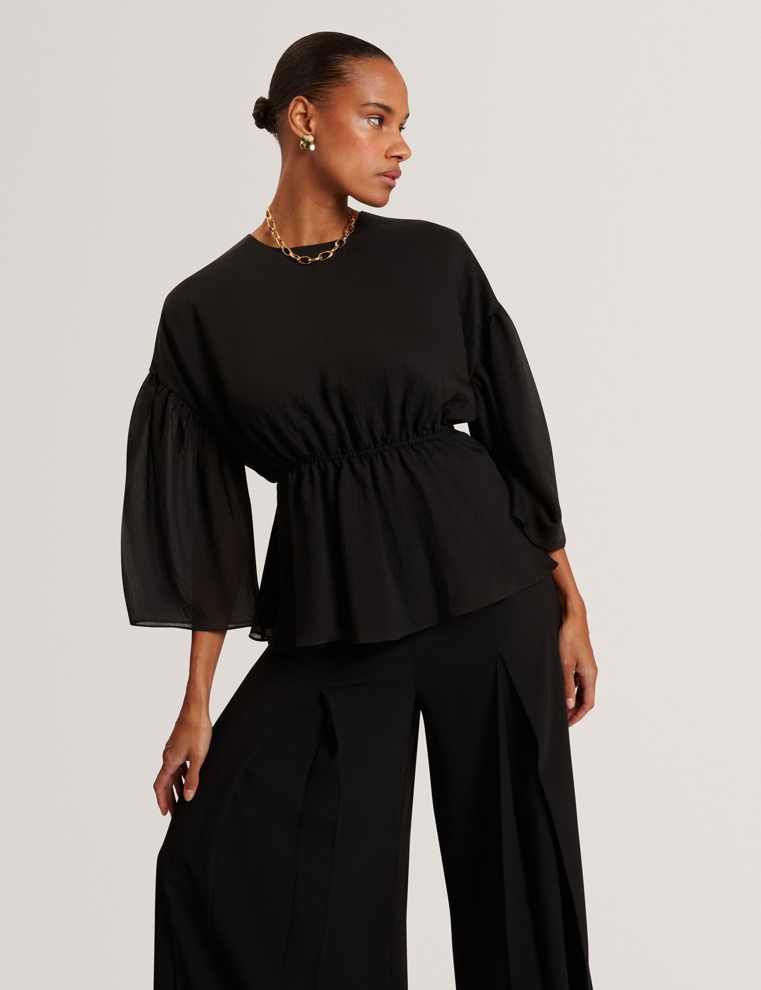 Lyocell Rich Puff Sleeve Peplum Top 7 of 7