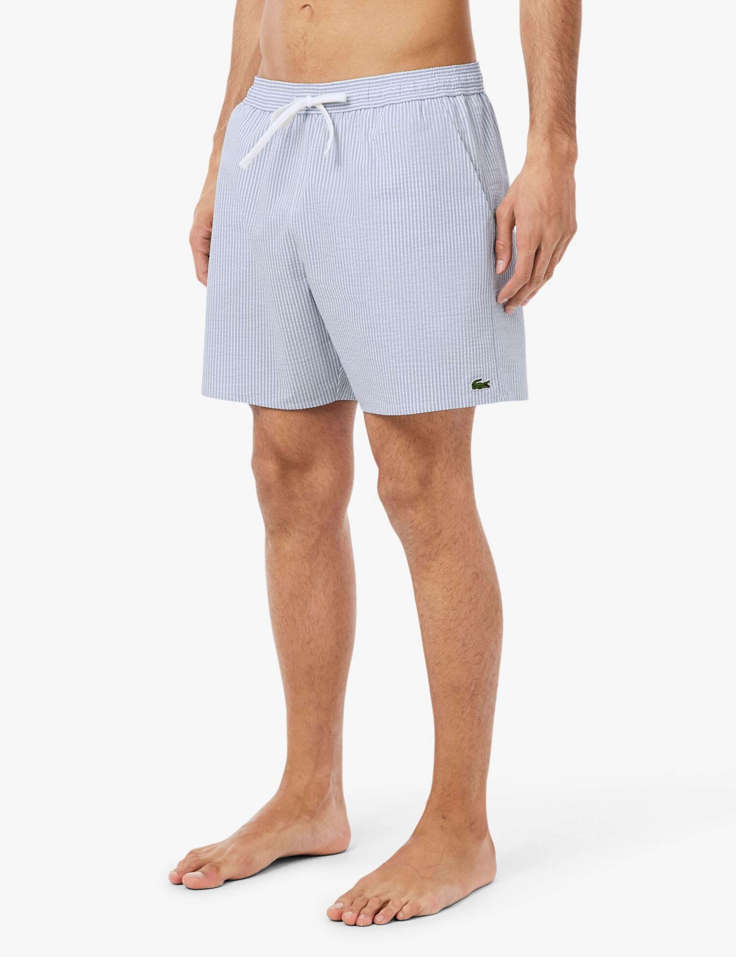 Mid Length Striped Textured Swim Trunks 1 of 10