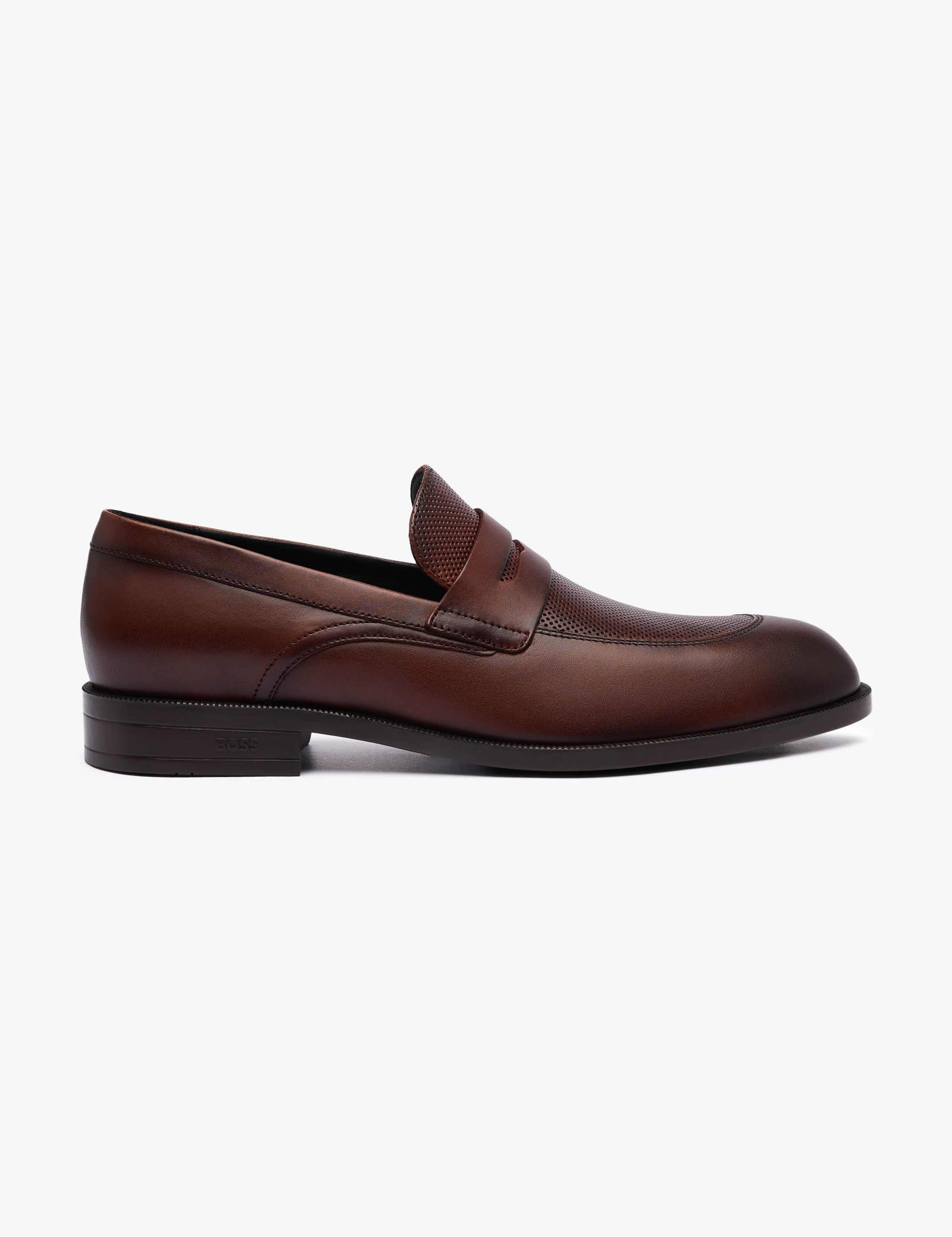 Penny-trim loafers in leather 1 of 2