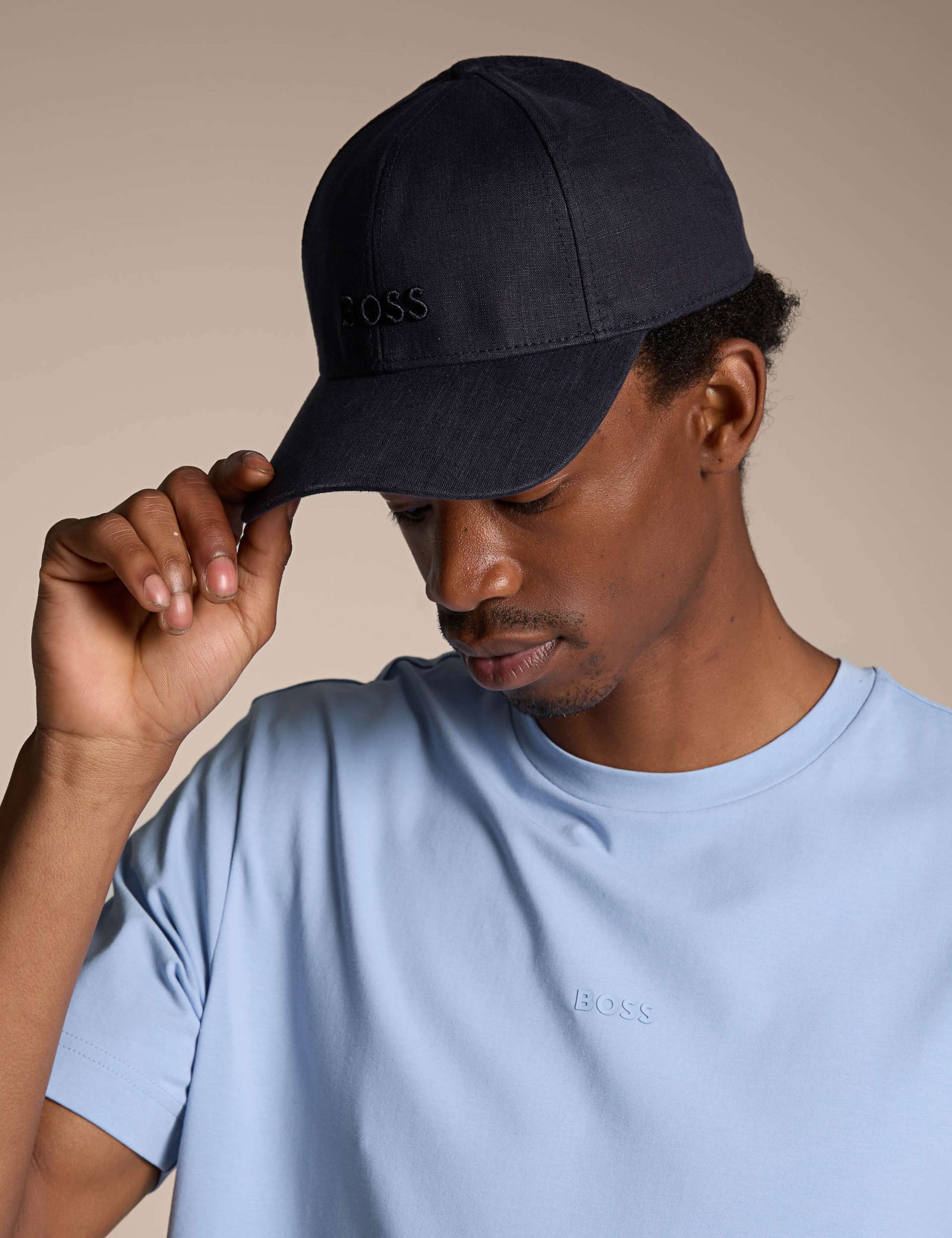 Baseball Cap with embroidered logo 1 of 3