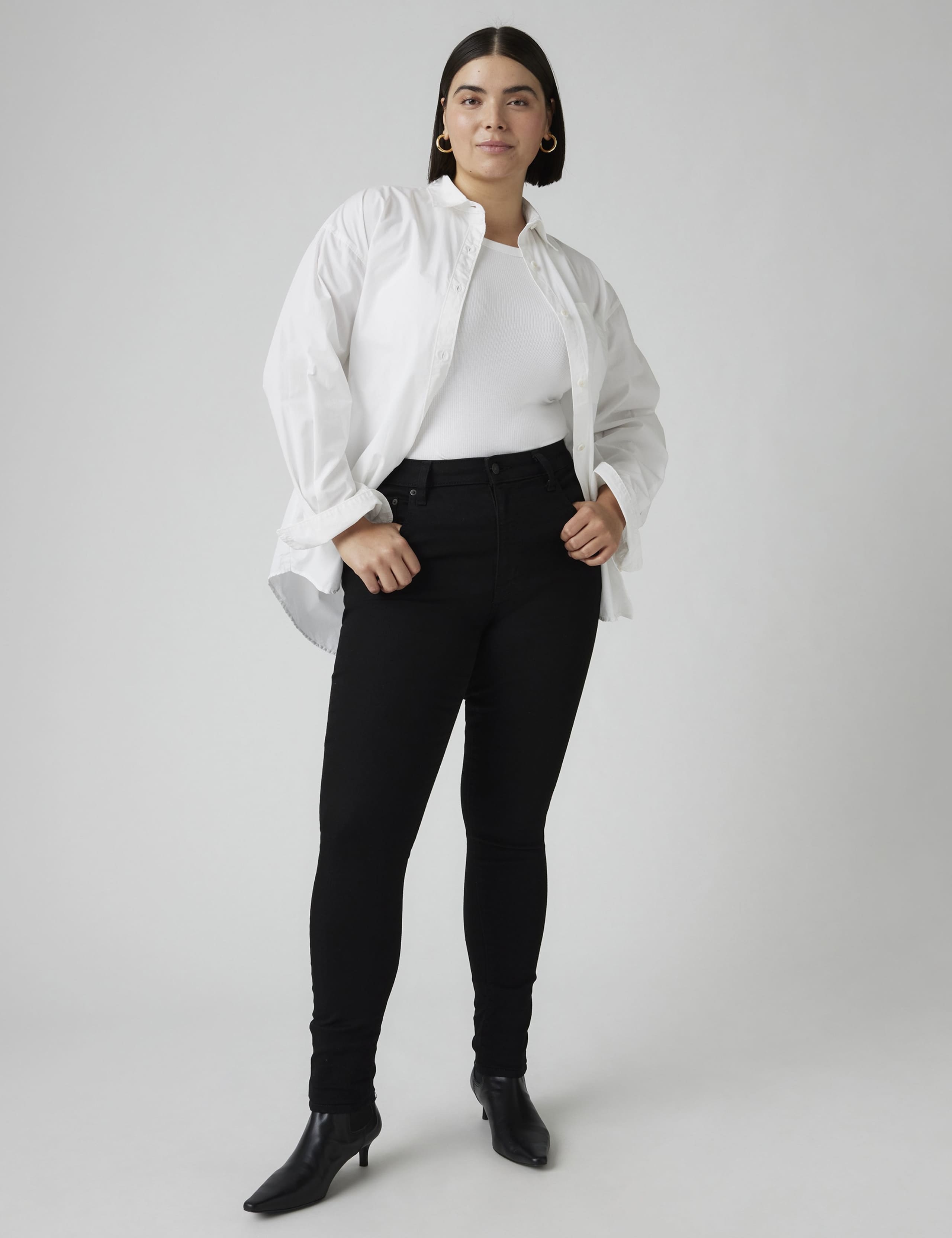721 High Rise Skinny Jeans 1 of 9