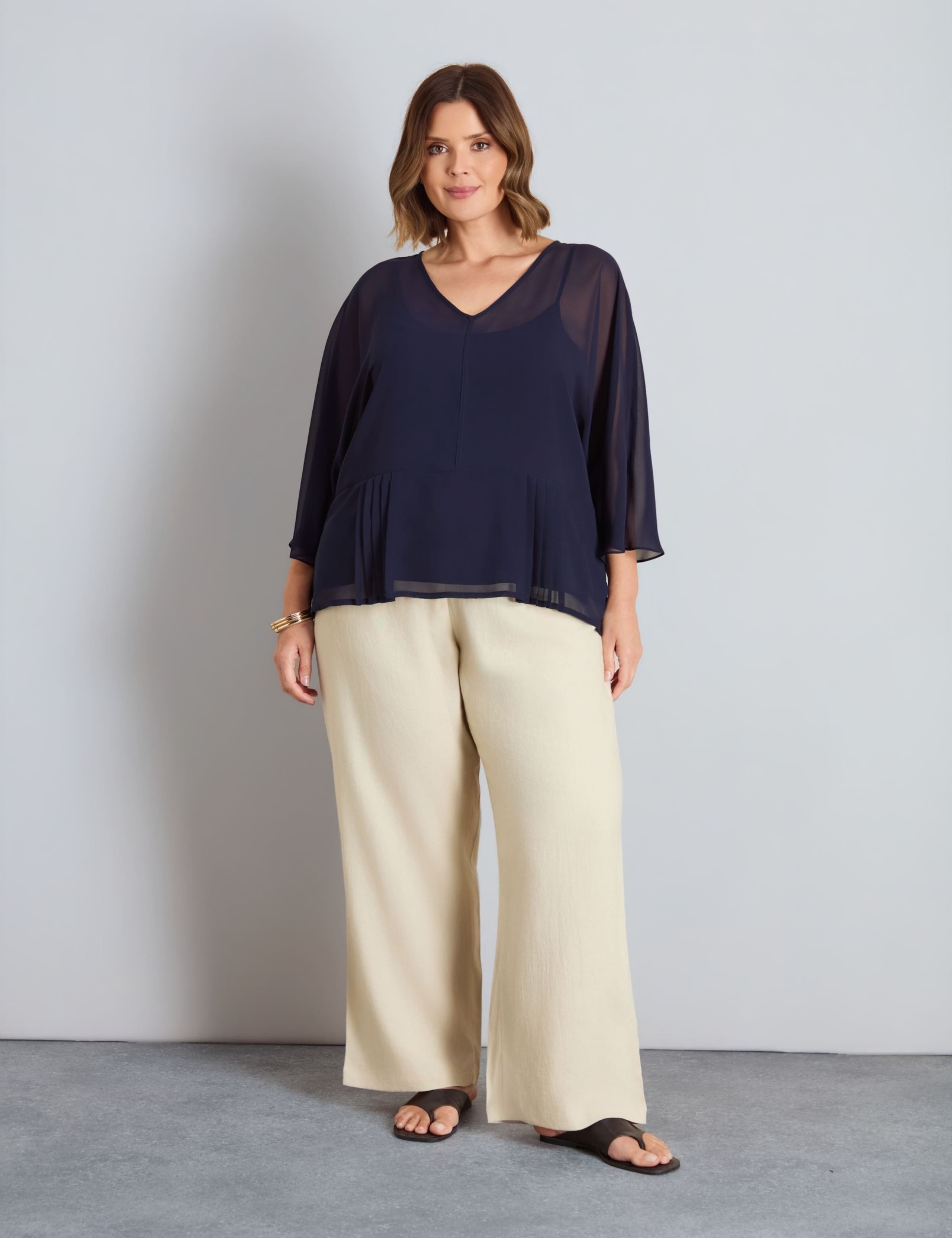 V-Neck Pleat Detail Peplum Blouse 2 of 4