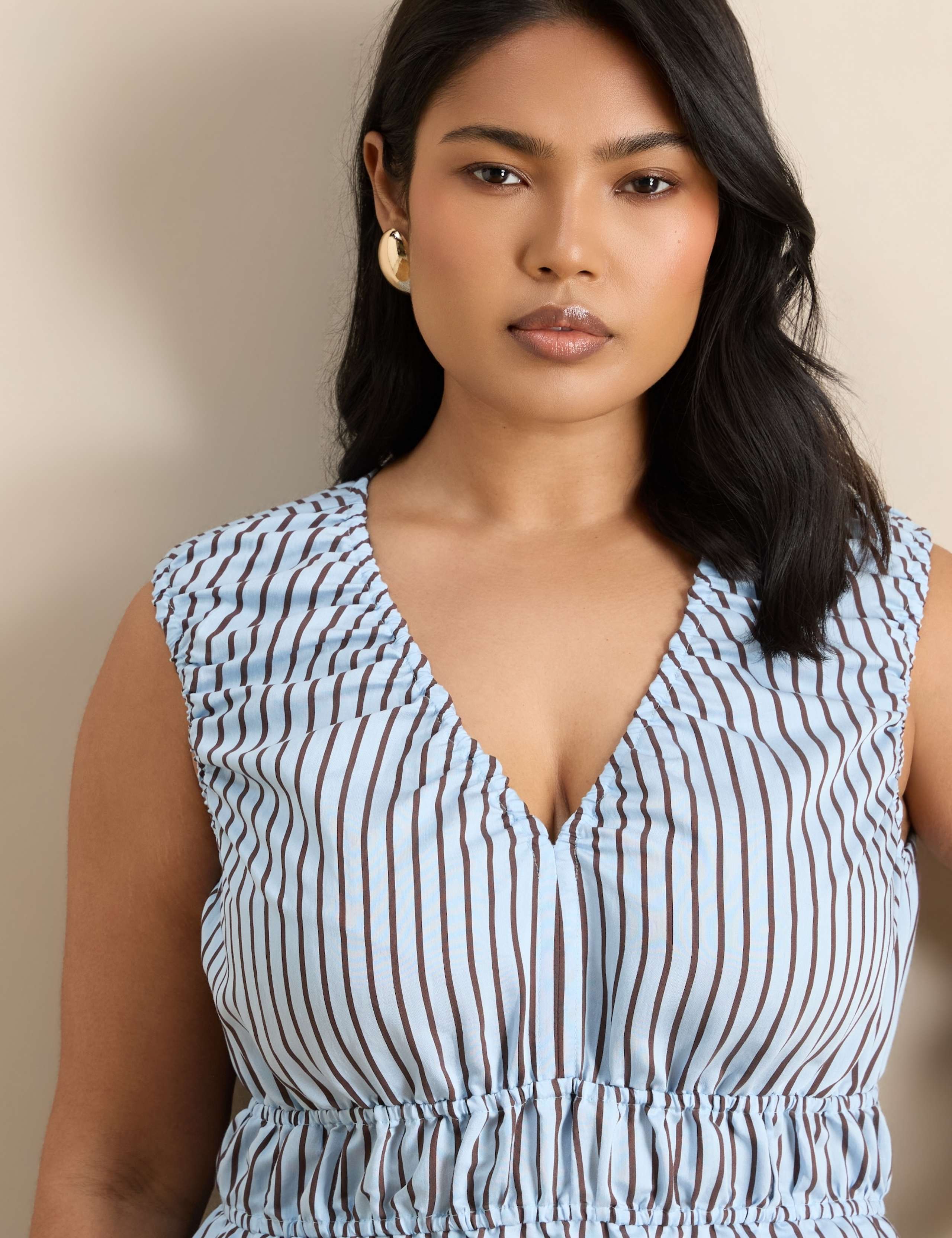 Modal Rich Striped V-Neck Peplum Top 5 of 6