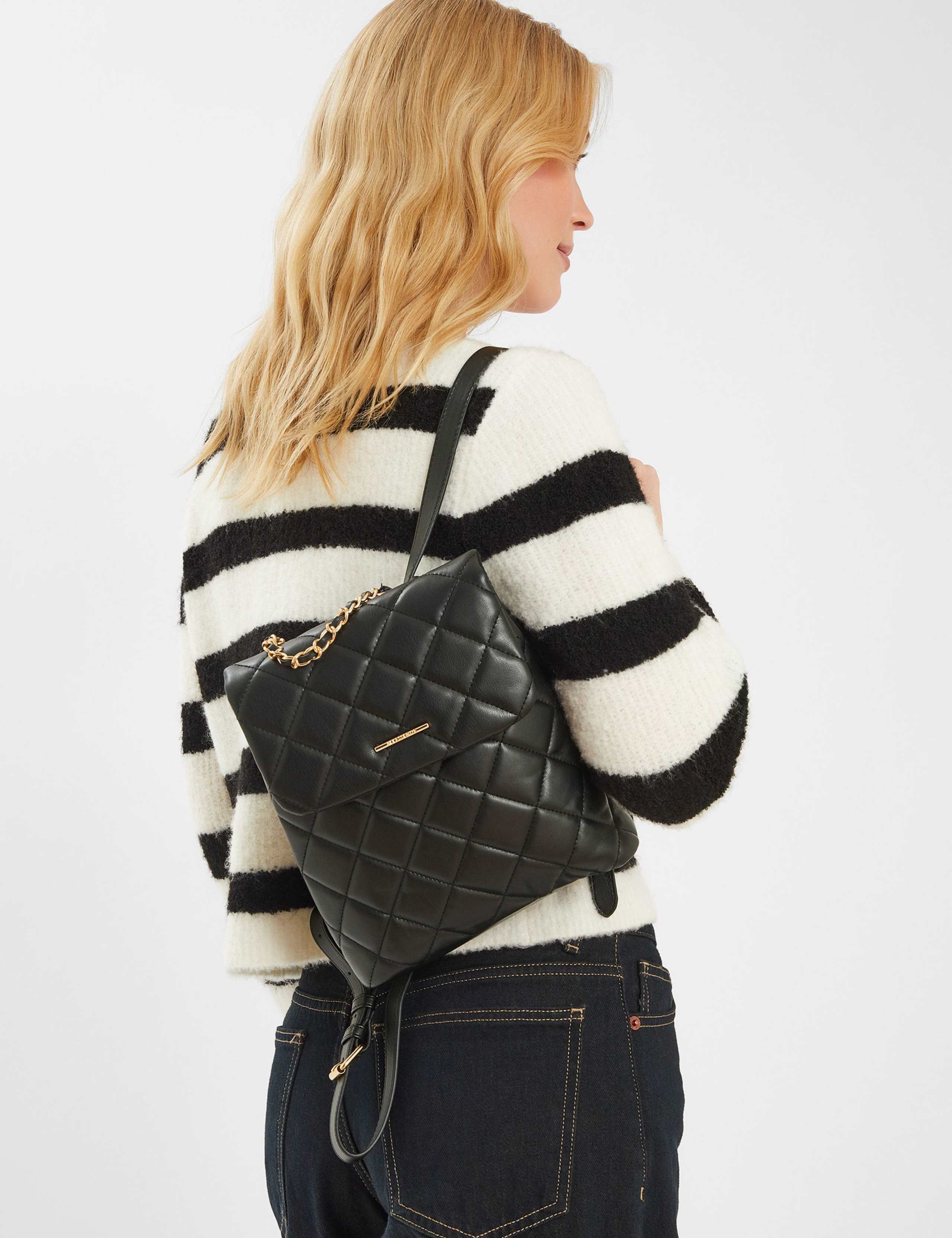 Faux Leather Quilted Backpack 1 of 4