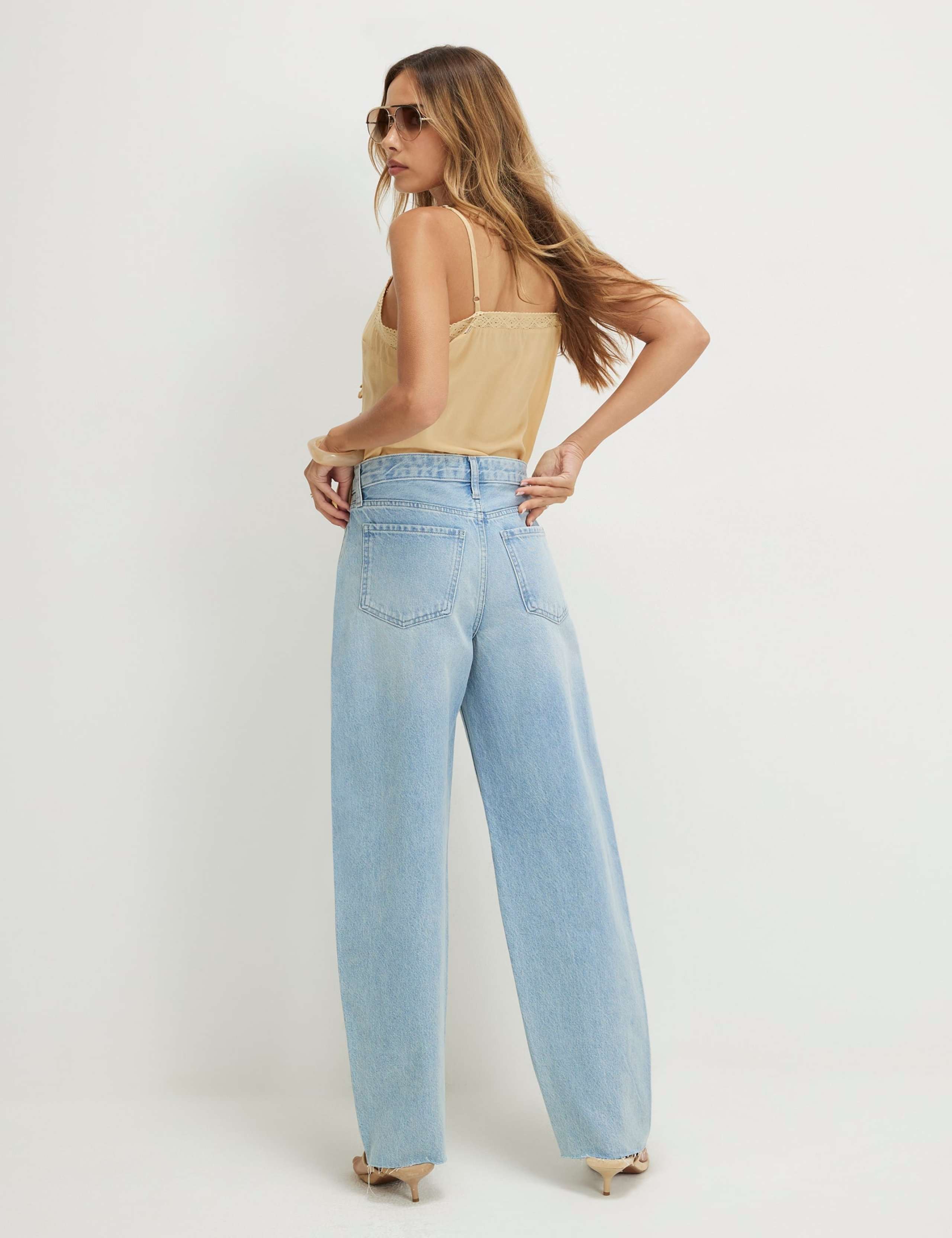Twist Seam Raw Hem Barrel Jeans 4 of 5