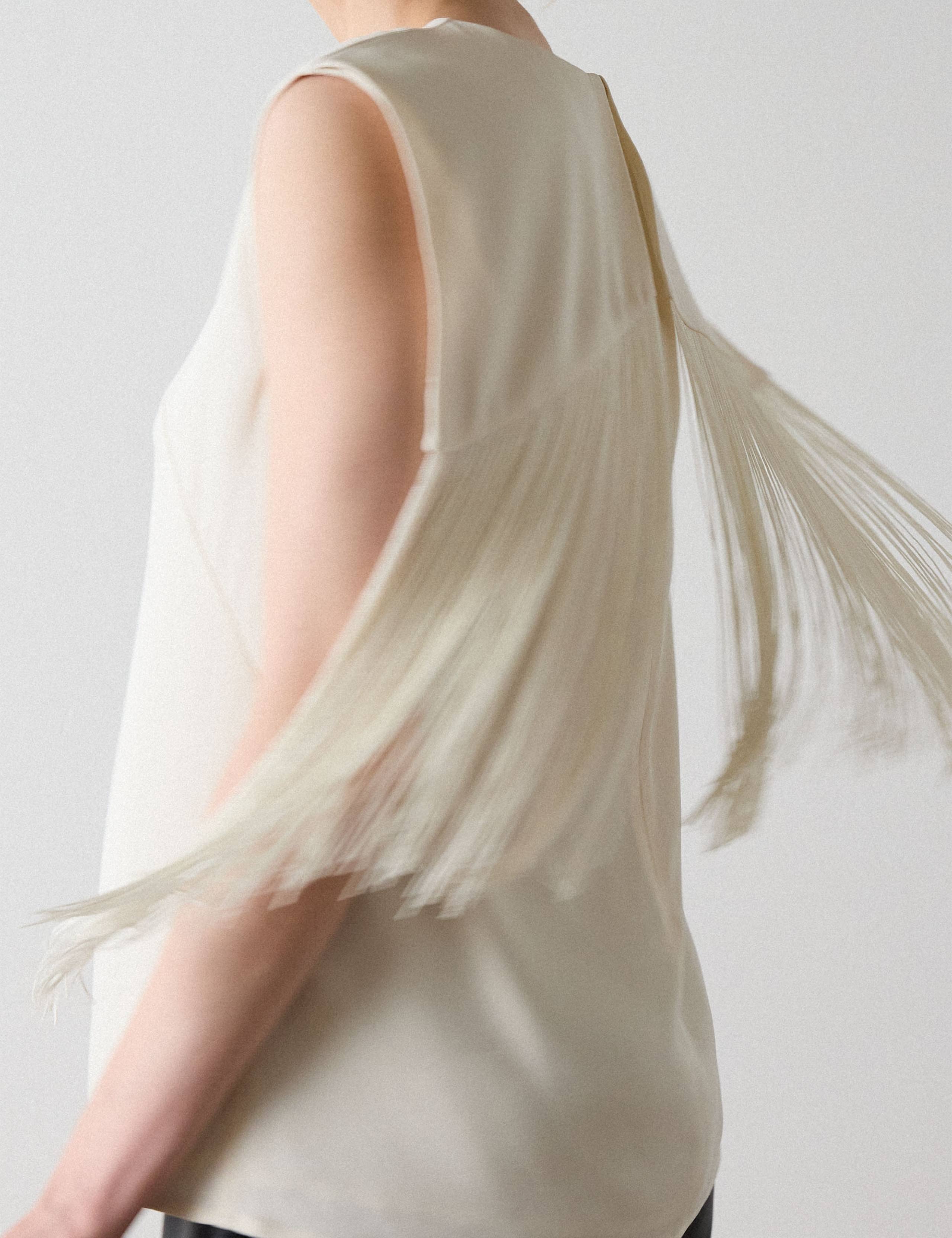 Fringe Detail Top 3 of 5