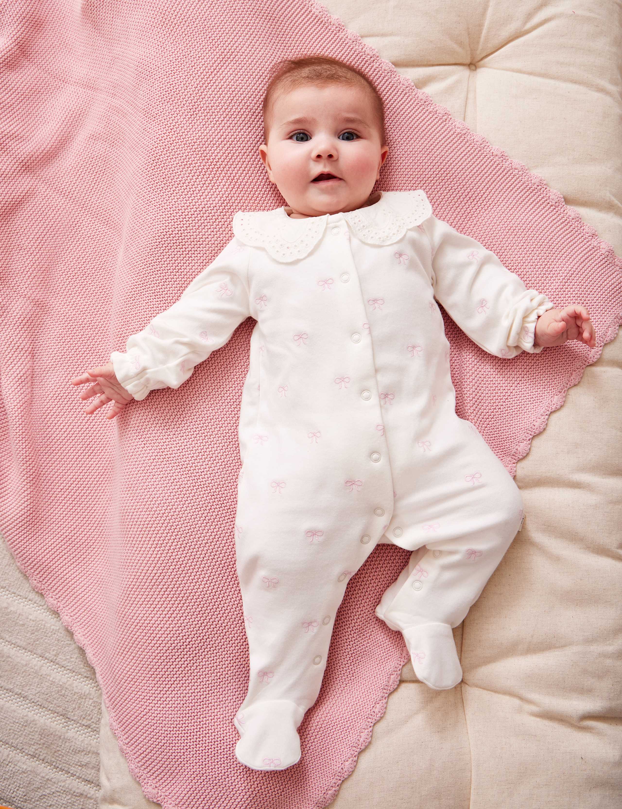 Pure Cotton Bow Sleepsuit (7lbs-18 Mths) 1 of 3