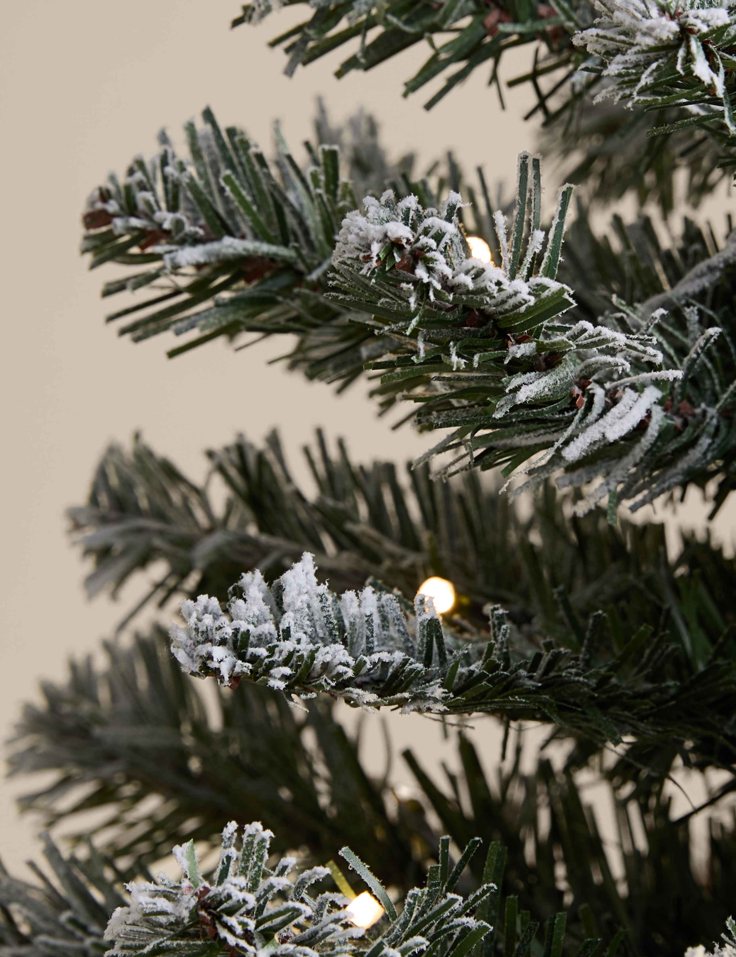 1.5ft Pre-Lit Snowy Christmas Tree 2 of 3