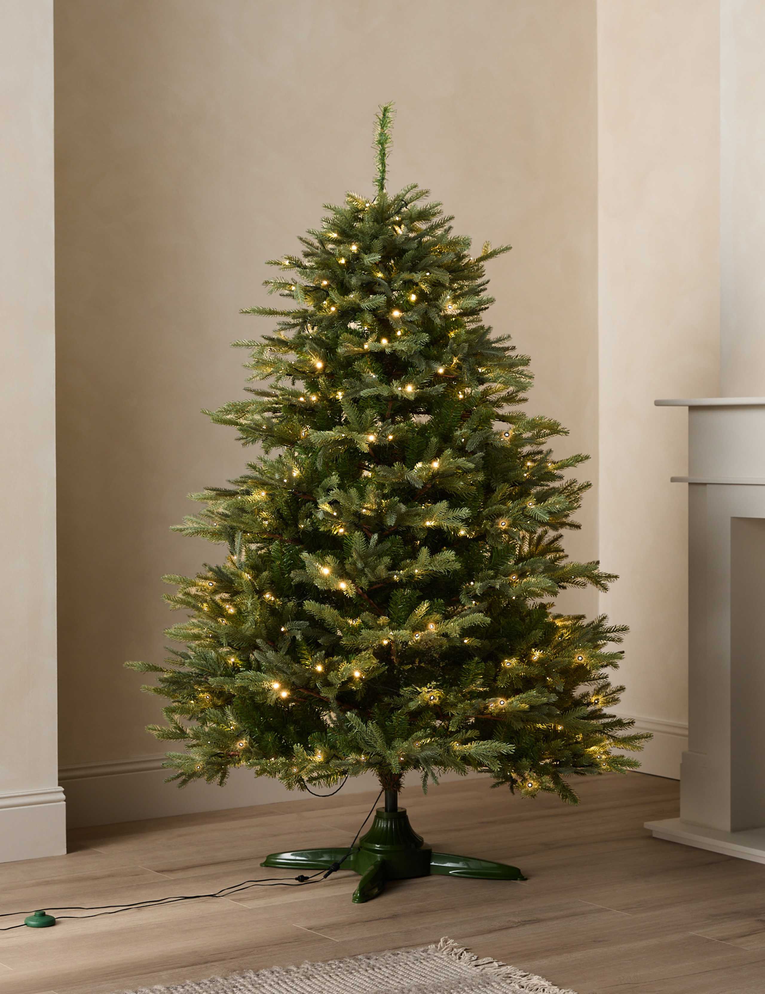 6ft Pre-Lit Grand Fir Rotating Christmas Tree 1 of 5