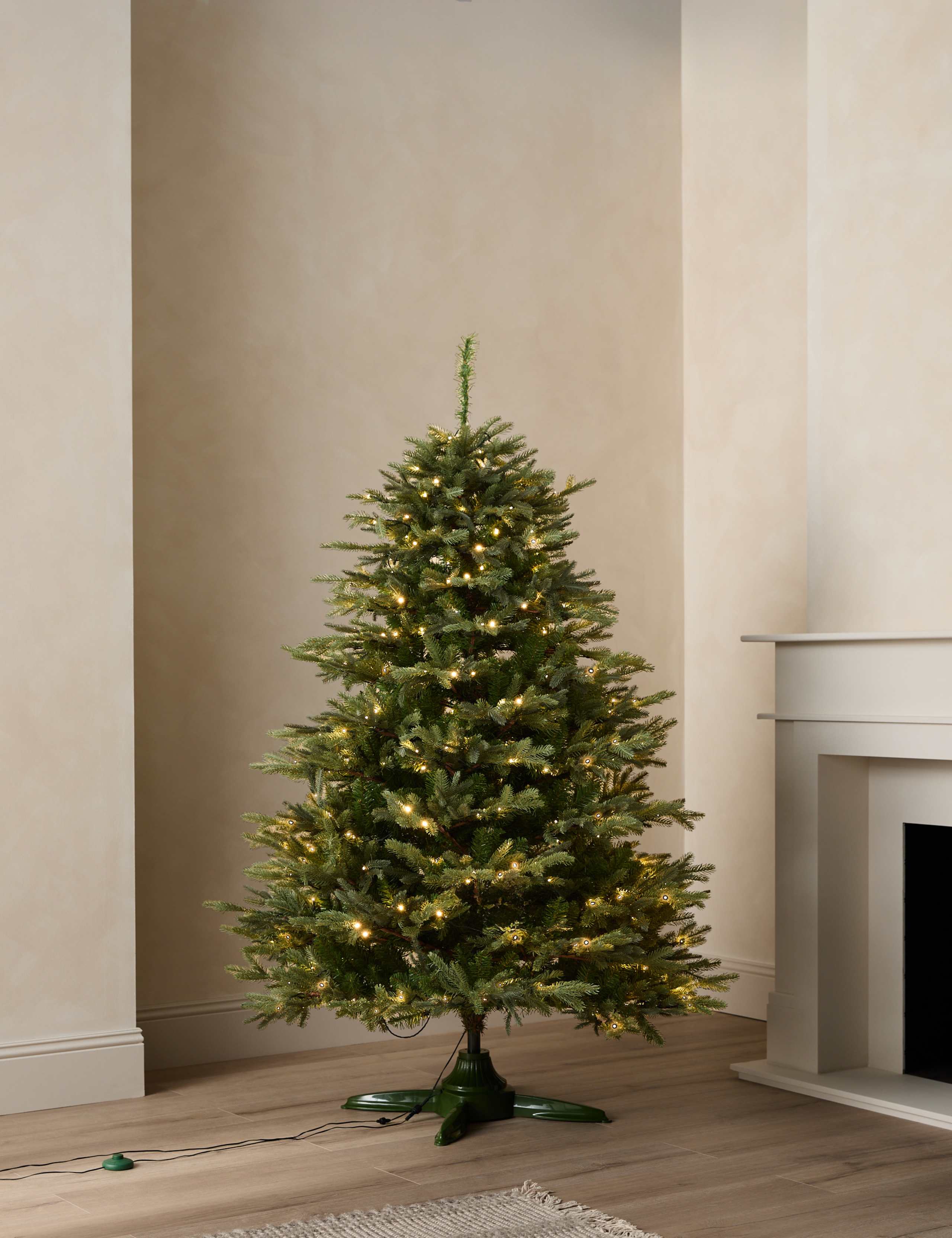 6ft Pre-Lit Rotating Grand Fir Christmas Tree 1 of 5