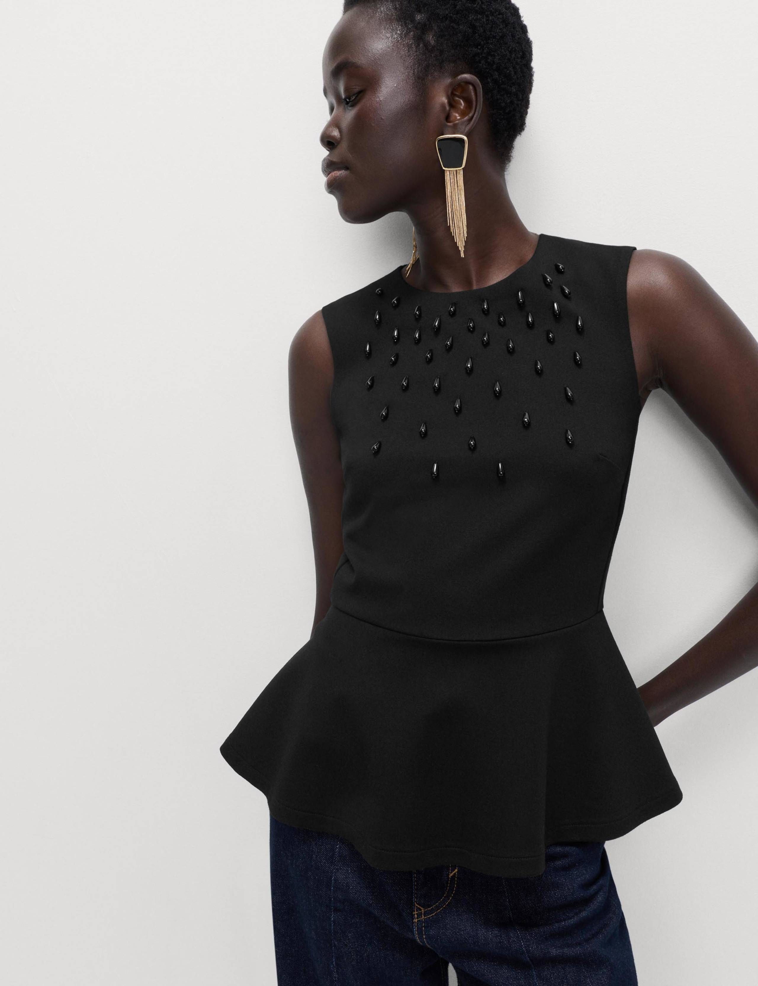 Embellished Fitted Peplum Top 1 of 5