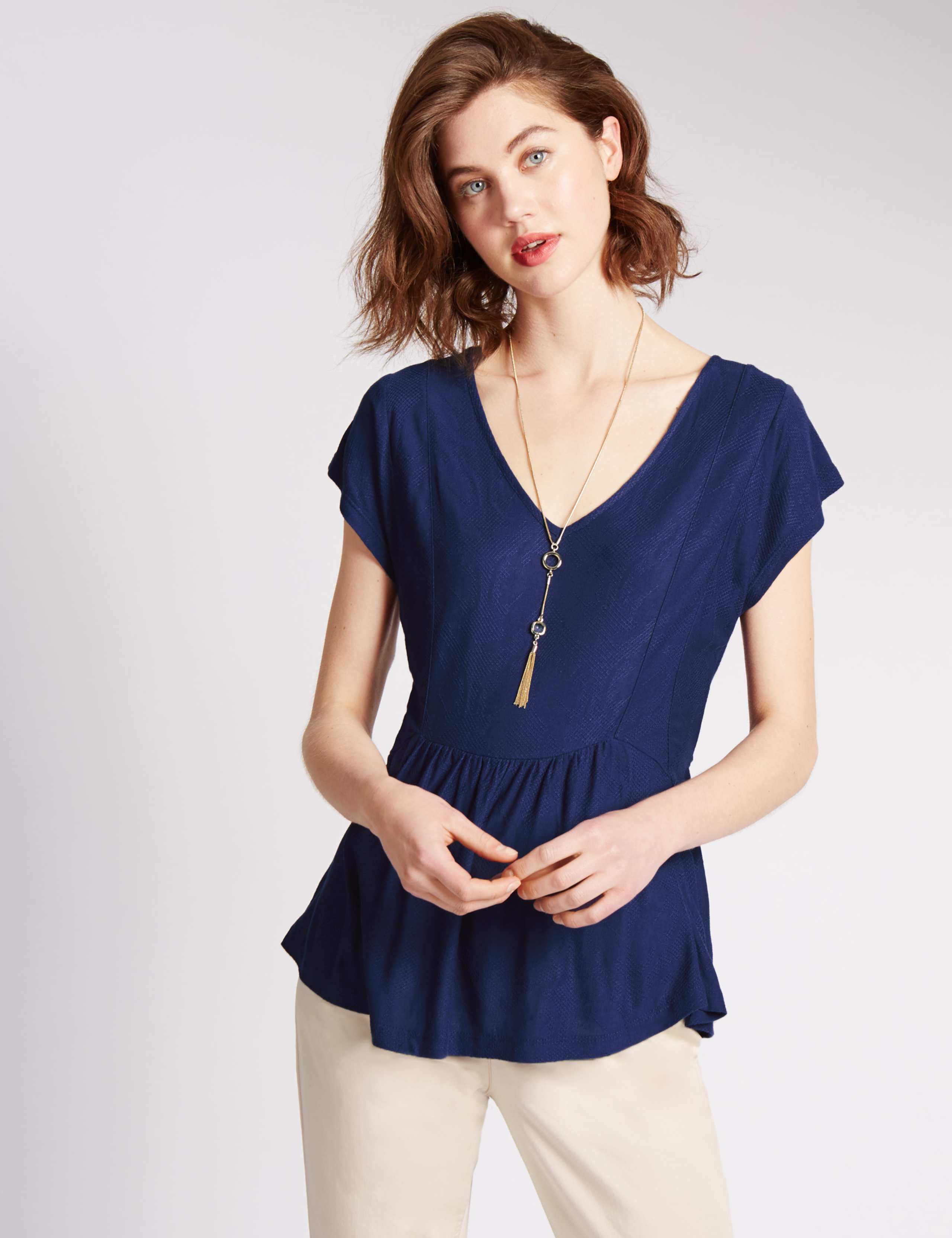 Peplum Textured Top 1 of 3