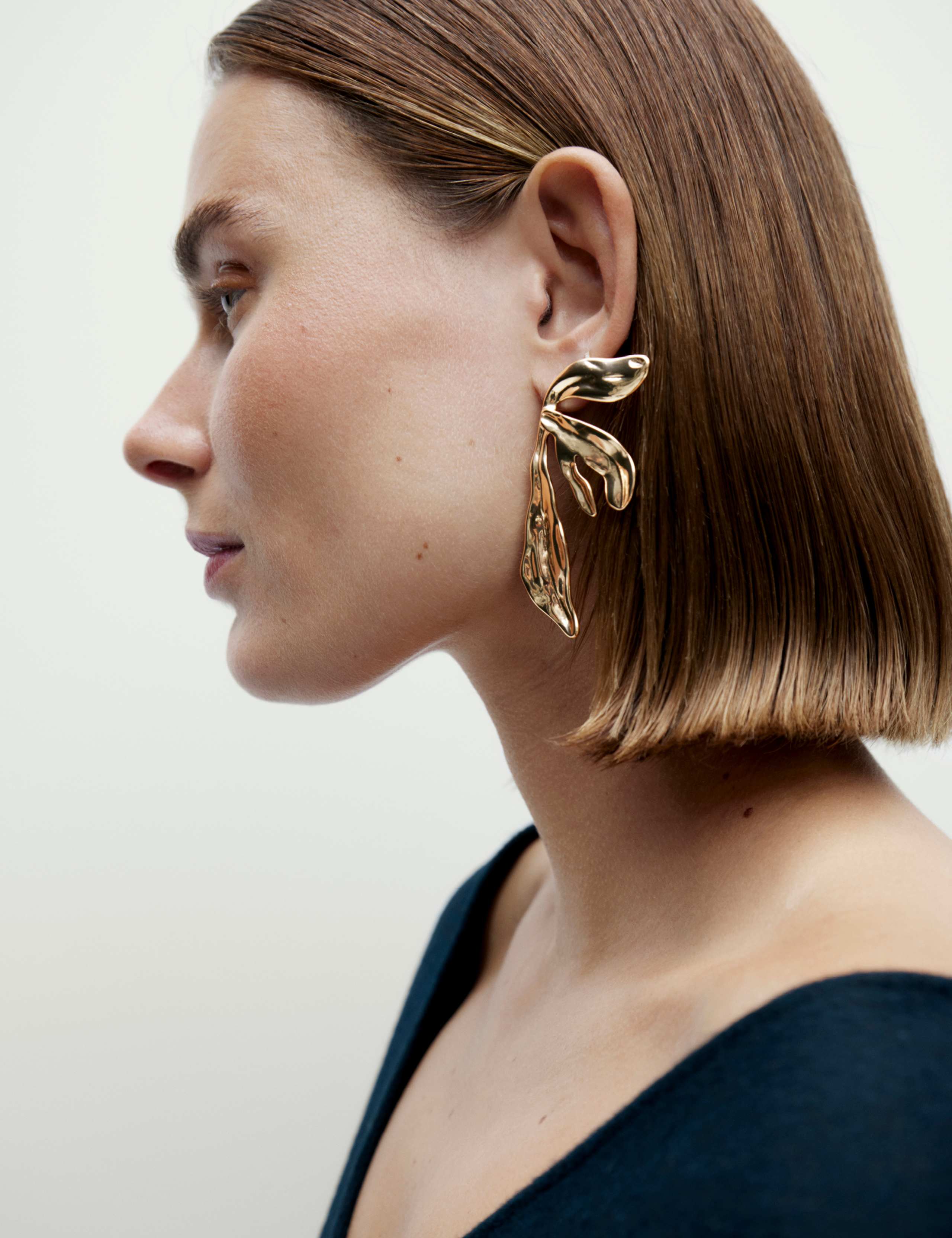 Gold Tone Oversized Leaf Earring 3 of 3