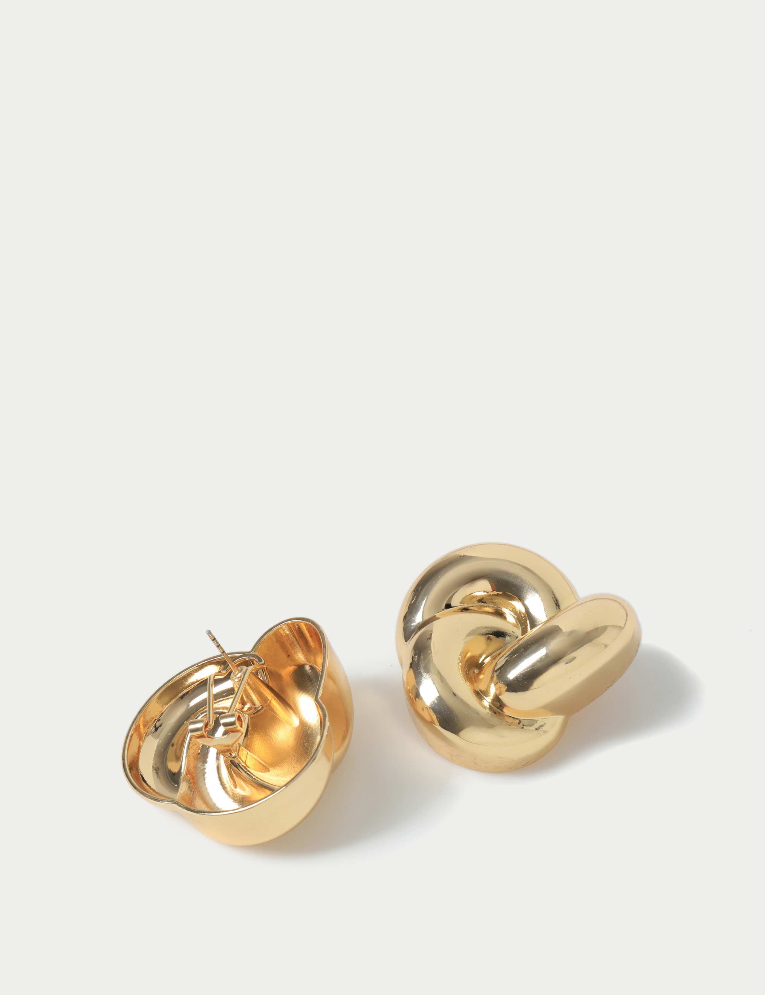 Gold Tone Oversized Twist Knot Earring 2 of 2