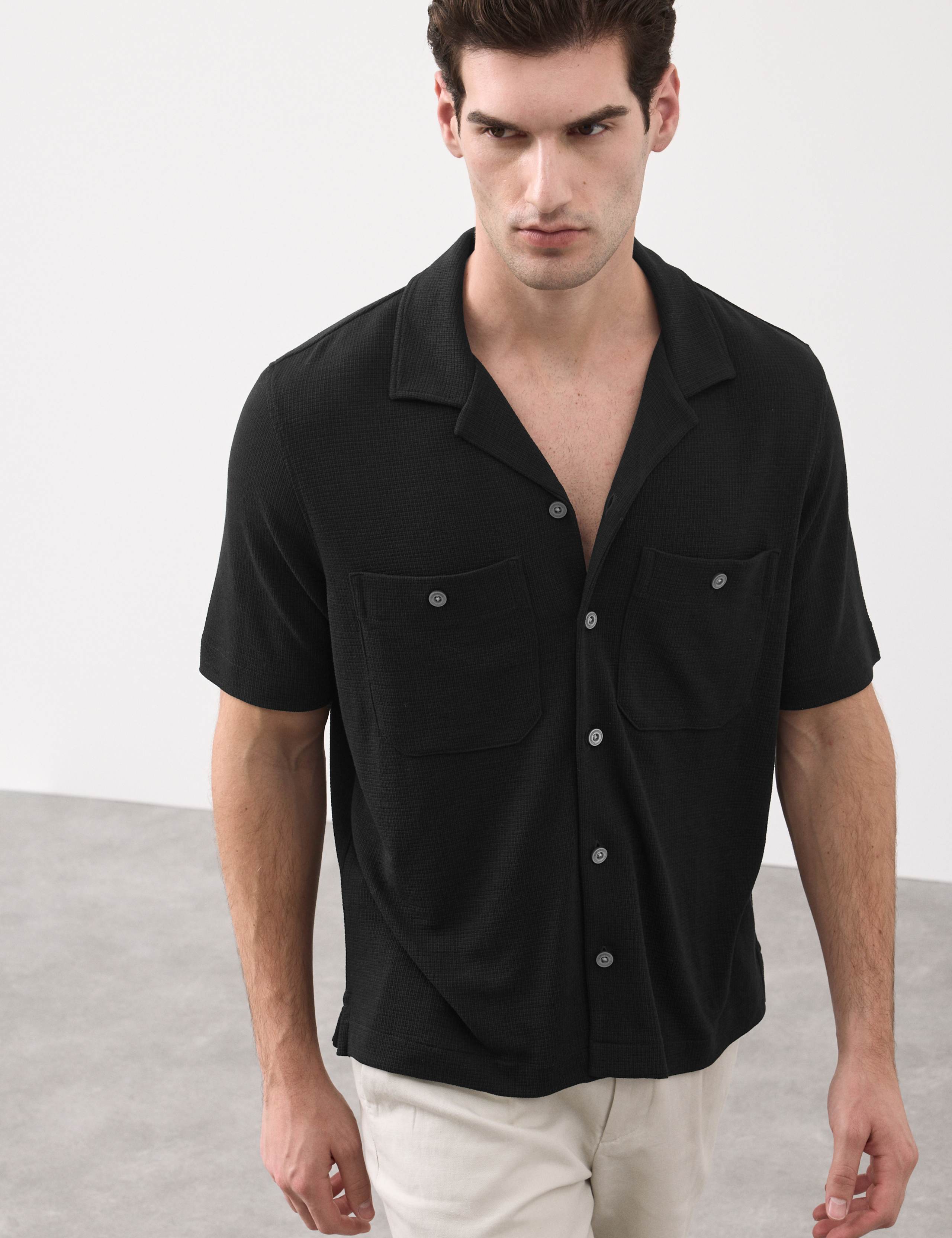 Relaxed Fit Modal Rich textured Button Through Polo 1 of 7
