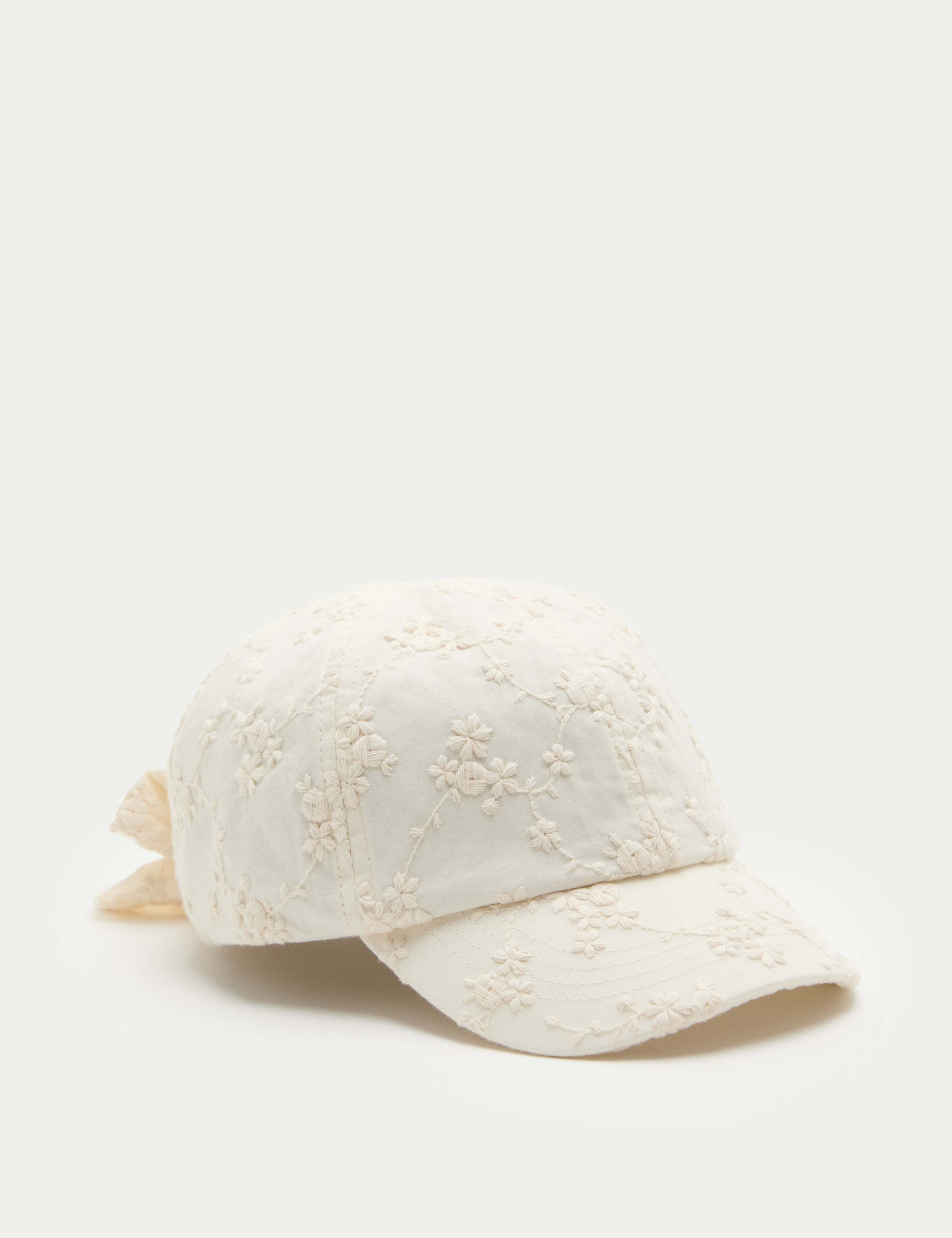 Kids' Pure Cotton Broderie Bow Back Cap (3-13 Yrs) 1 of 3