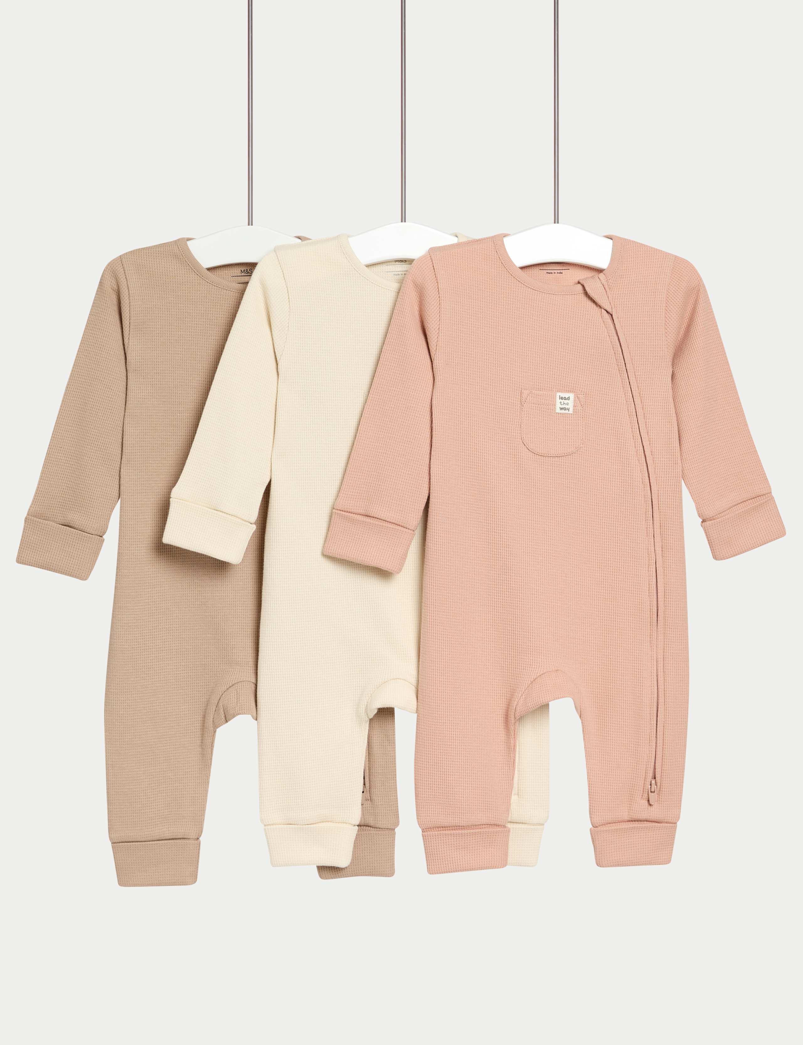 3 Pack Pure Cotton Waffle Zip Sleepsuits (6½lbs-3 Yrs) 1 of 2