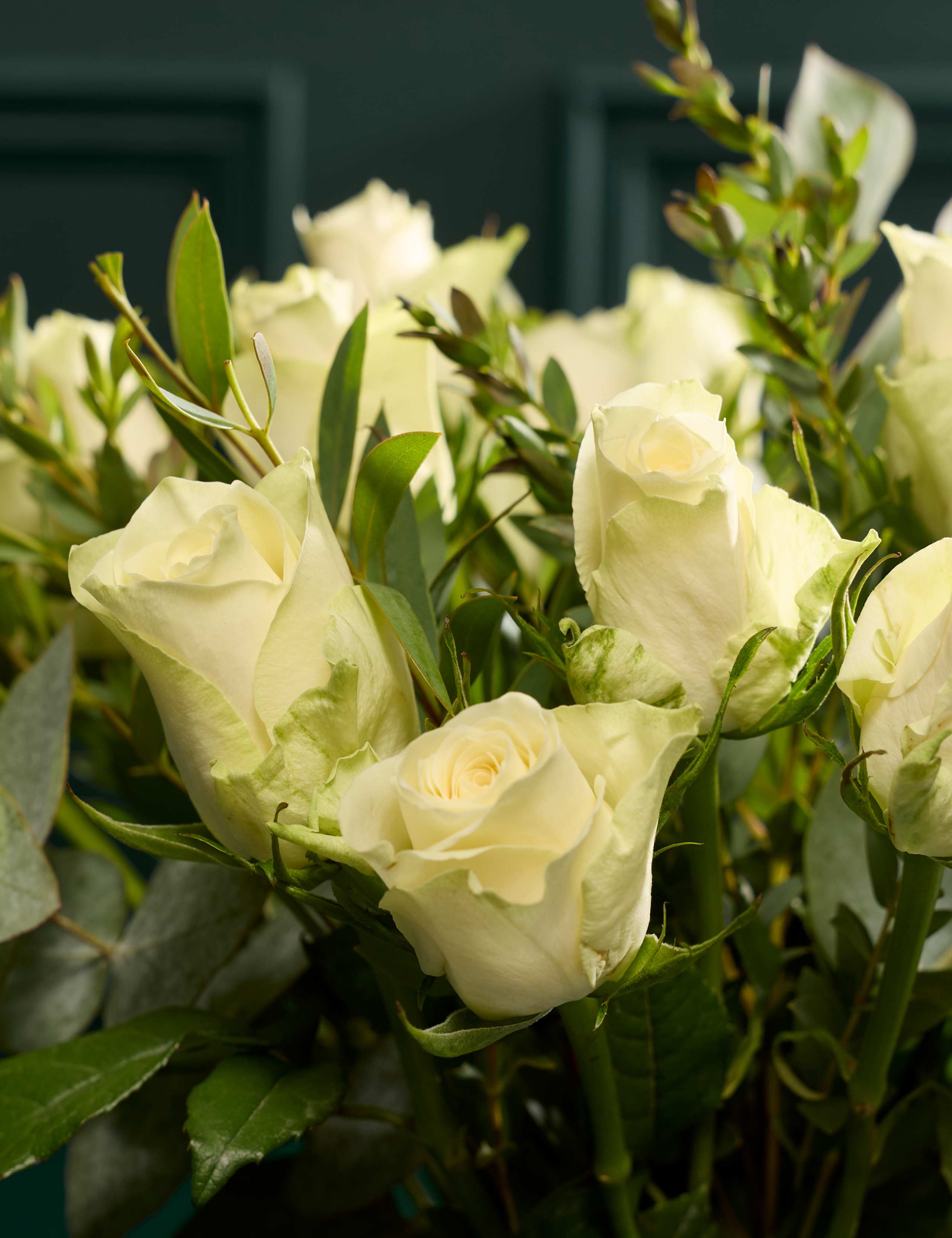 Festive White Rose & Eucalyptus Bouquet with Vintage Champagne 3 of 6