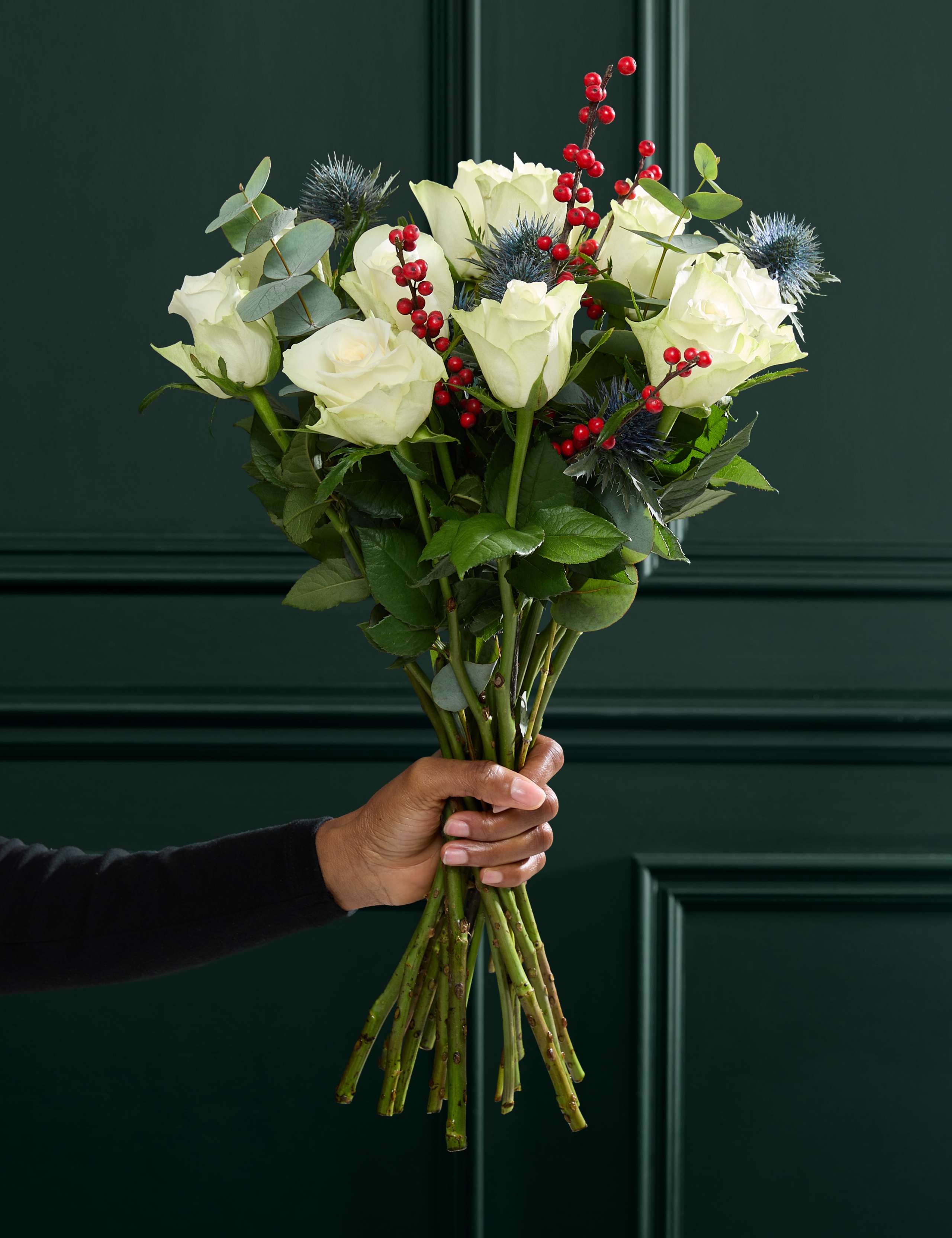Festive White Rose & Ilex Bouquet 1 of 7