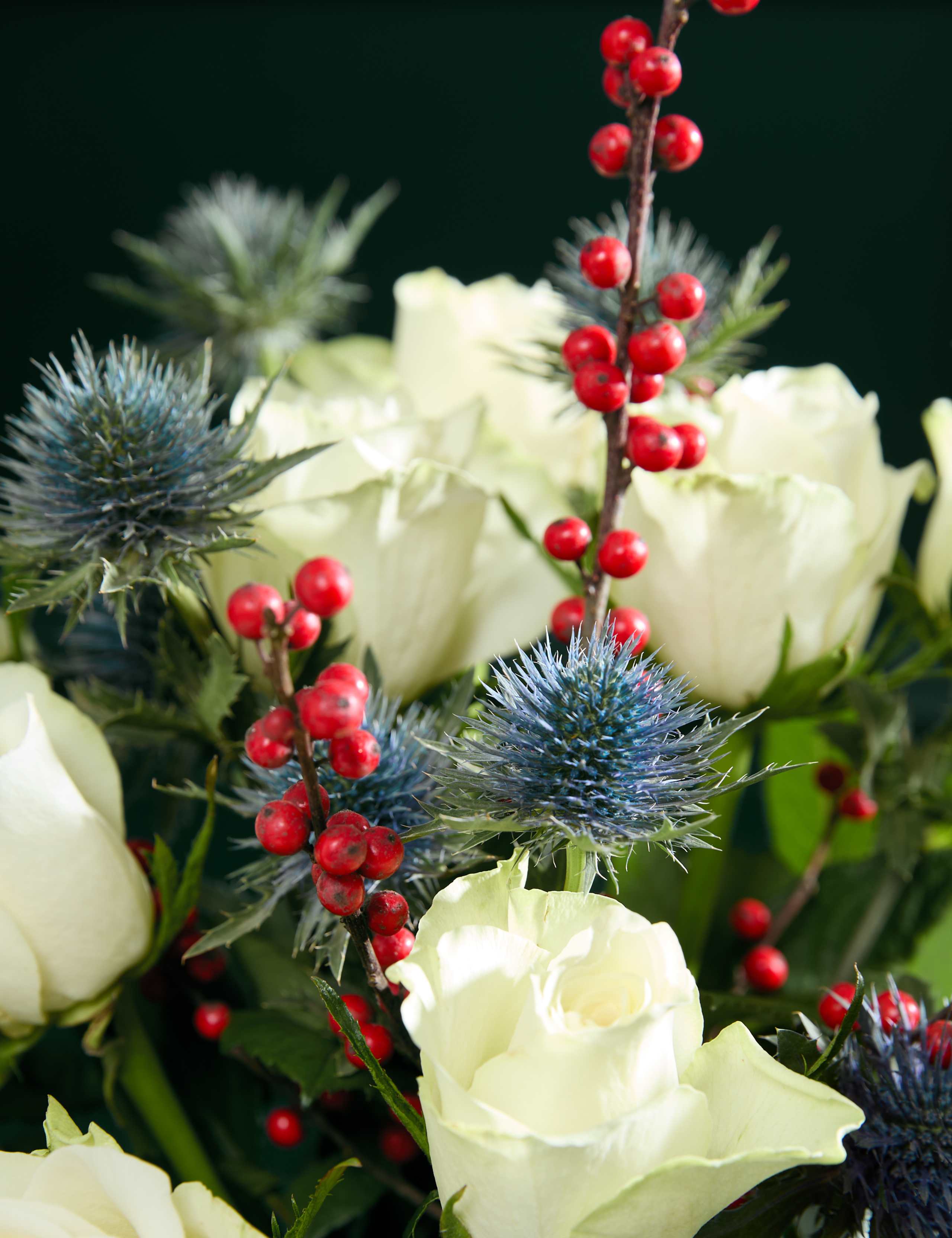 Festive White Rose & Ilex Bouquet 3 of 7